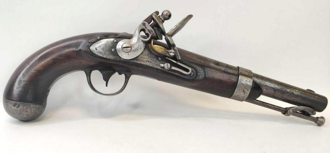 U.S. Model 1836 flintlock pistol, Robert Johnson: lot is a U.S. Model 1836 flintlock pistol was manufactured in 1842 by Robert Johnson of Middletown, Connecticut. The pistol has the distinctive swivel ramrod with button-shaped head, barrel band with