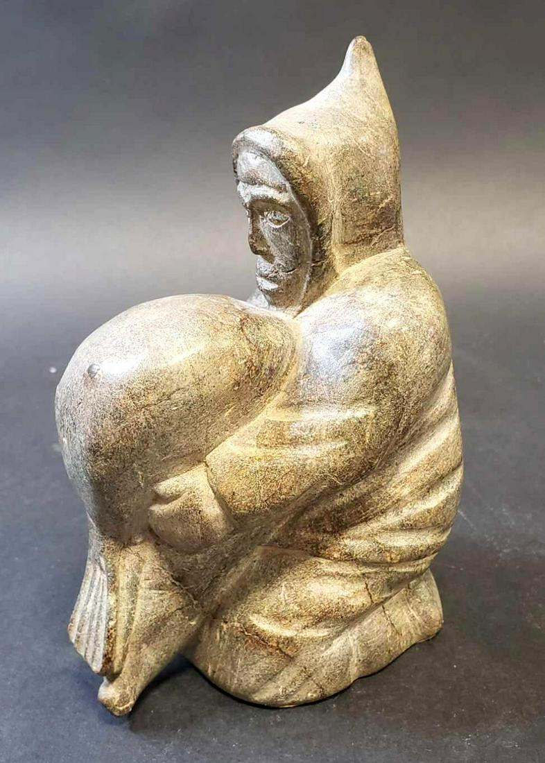 Inuit Soapstone Carving of Hooded Native Man with Seal (1 of 3)