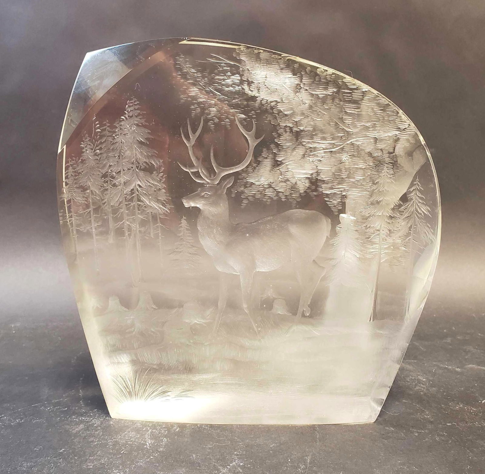 Moser Stag Motif Crystal Sculpture: The large crystal glass piece etched with an image of a stag in a forest. Measures 8"x 8" x 1.5".Â Collectibles