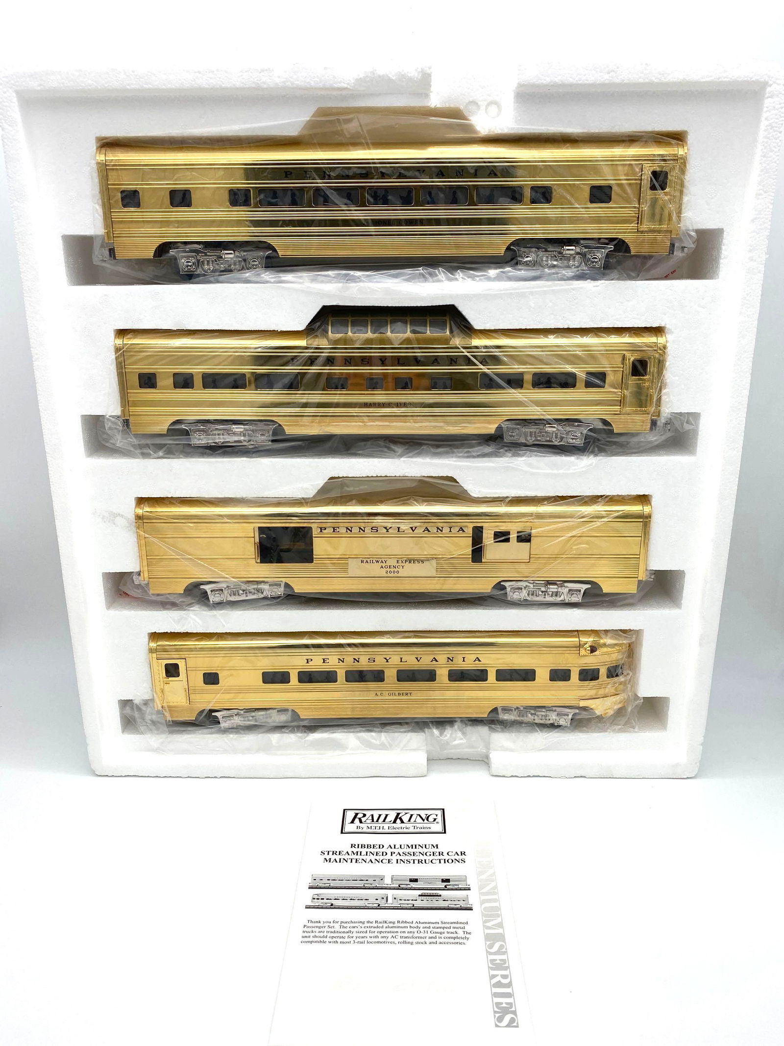 Pennsylvania Aluminum Four Car Passenger Set : Rail King 30-6707. Pennsylvania 4 Car 60’ Aluminum Passenger Set. 18K Gold Plated. Baggage Car, Passenger Car, Vista Dome & Observation Car. New in box. O Gauge.