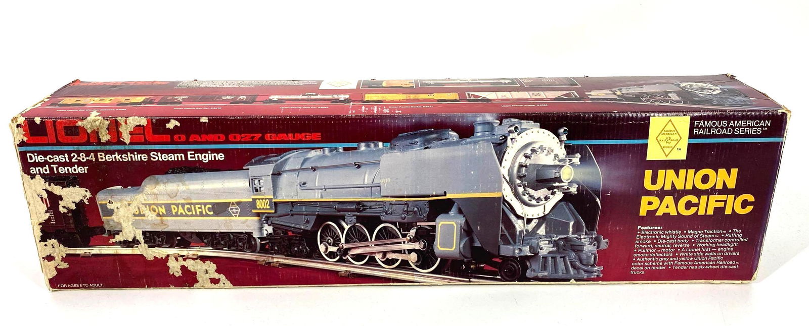 Lionel Union Pacific 8002 Engine & Tender: Lionel 6-8002. Union Pacific Die Cast 2-8-4 Berkshire Steam Engine and Tender. Engine & Tender show minor wear from use. In original box. Box shows heavy wear and some minor paper loss. Untested. O Ga