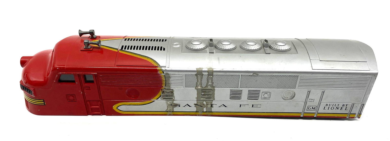 Lionel Santa Fe Locomotive Shell Only : Lionel 2383. Santa Fe Diesel Locomotive Shell Only. Also includes a Russian made die cast car. O Gauge.
