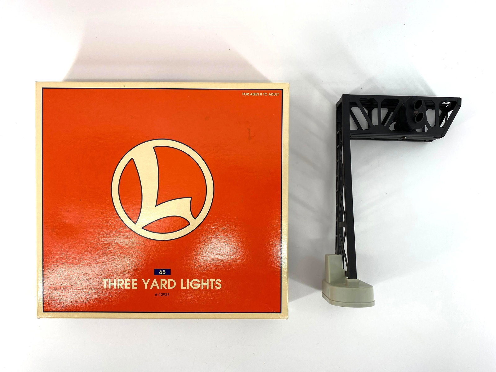 Lot of 2 Lionel Lights : Lionel 452 & 6-12927. Overhead Gantry Signal Box in used condition. Yard Lights are missing one light. Untested. All O Gauge.