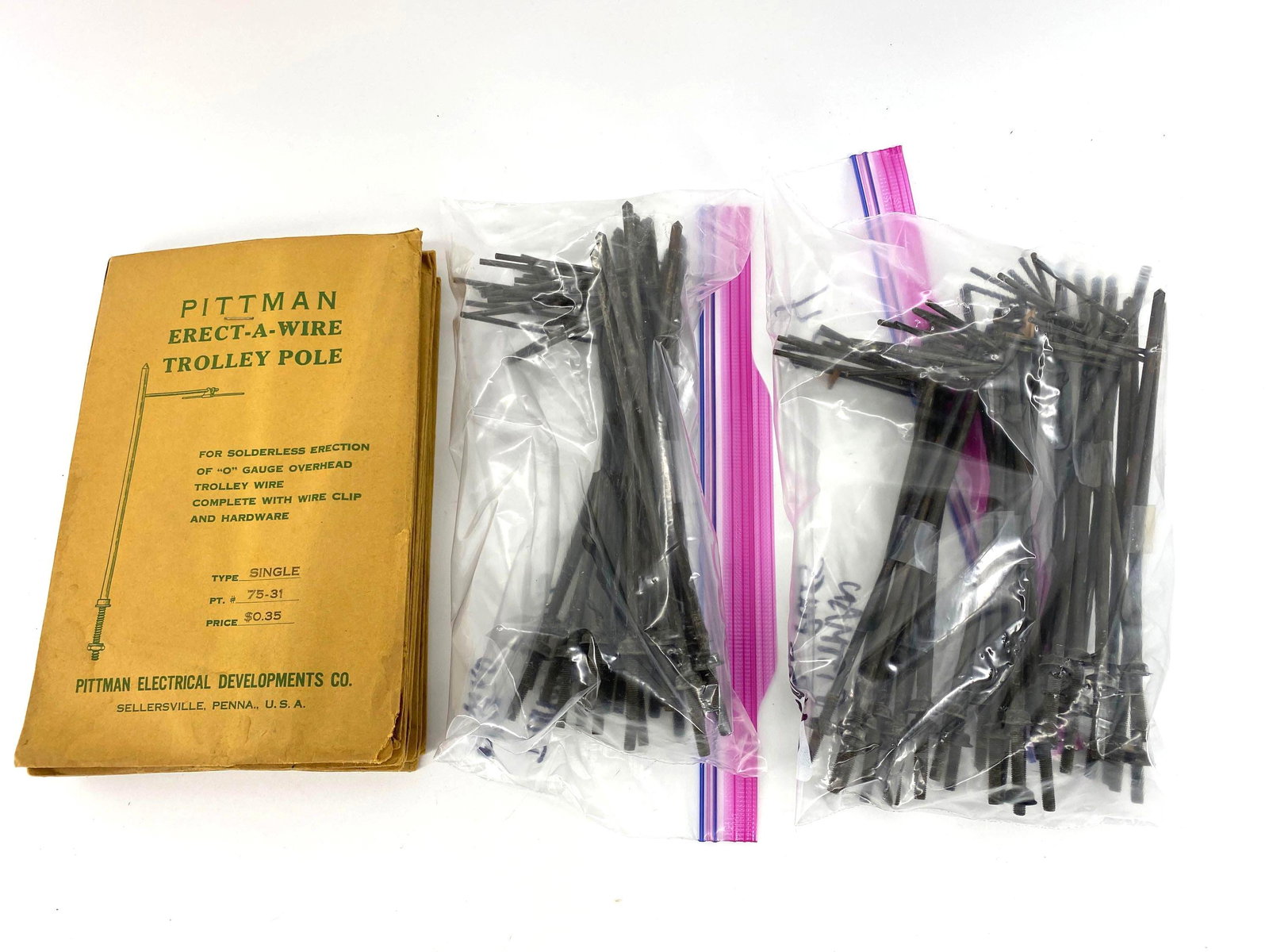 Lot of 69 Pittman Overhead Poles : Lot of 69 Pittman Metal Overhead Poles. 11 are in their original packaging and have not been opened. O Gauge.
