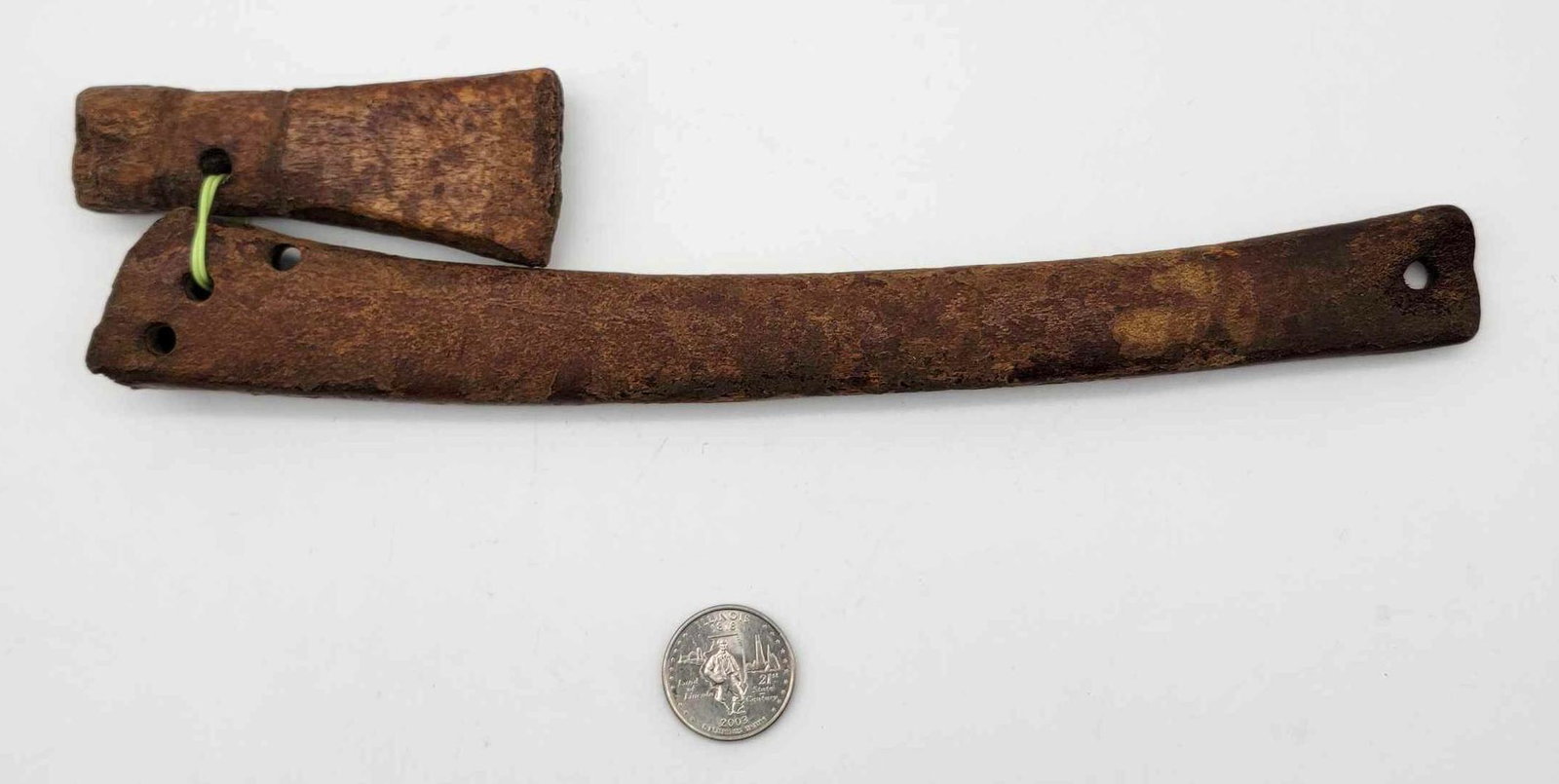 Large Eskimo Adze Artifact: A large fossilized bone Eskimo Adze with detached but matching body and head, recovered from Pt. Hope in the 1940's. The handle measures approximately 10.5" long.