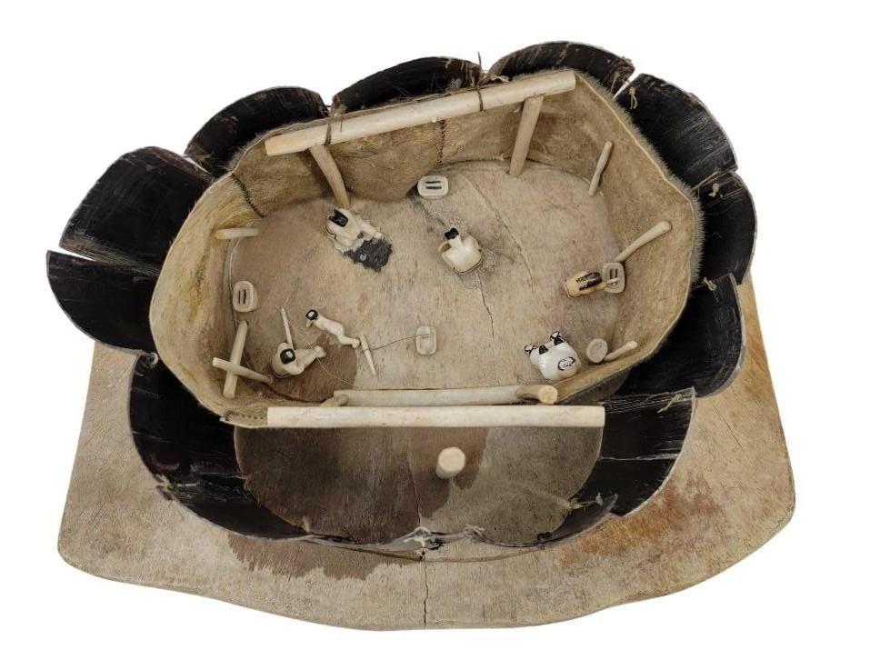 Alvin Aningayou Yup'ik House Diorama: A diorama representing a traditional Siberian Yup'ik nomadic house constructed from fossil bone, baleen, seal fur, and walrus tusk. Signed for Alvin Aningayou of St. Lawrence Island. Measures appr