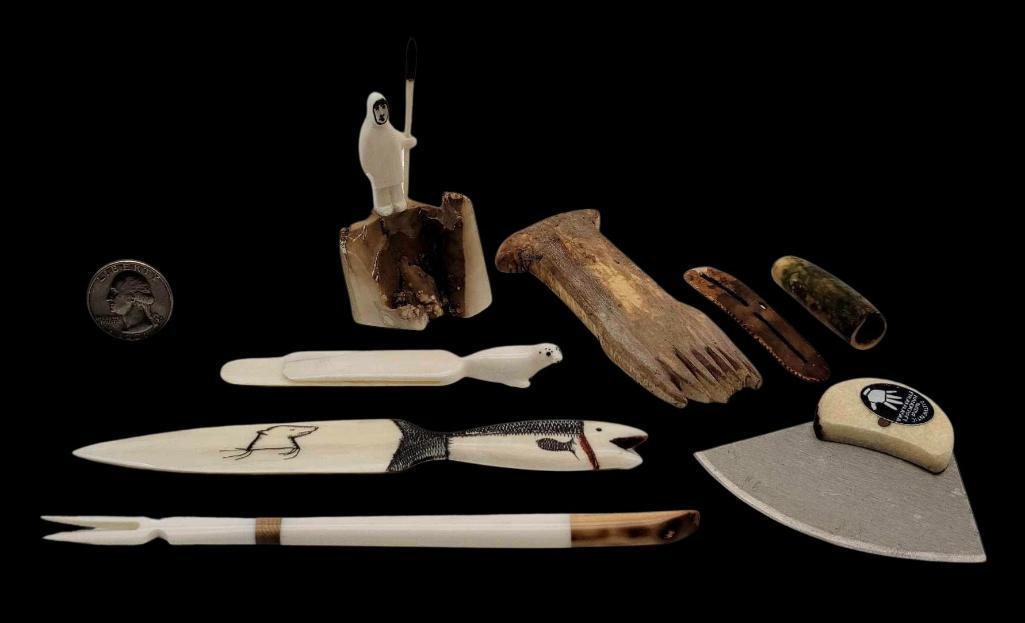 Grouping of Eskimo Carvings, Artifacts & Objects: Eight objects in total. Includes two artifacts- a fossil walrus tusk comb and socket, an Eskimo hunter figurine on a fossilized walrus tusk base, an ulu knife with walrus tusk handle, a walrus tusk cl