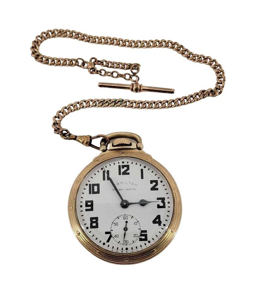 Hamilton 992B Railway Special Pocket Watch: A Hamilton 992B Railway Special 10-karat gold filled, lever-set 21-jewel pocket watch with chain, bearing serial number C195889 in running condition. Measures approximately 2" in diameter, the cha