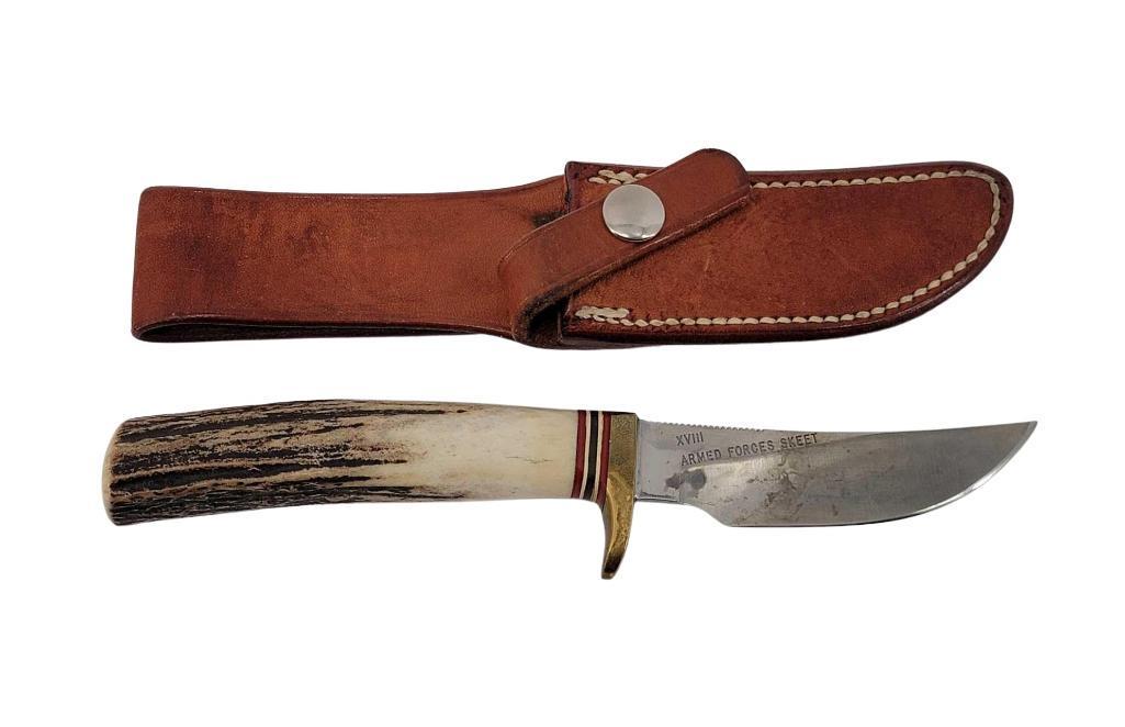 Randall Model 8 Armed Forces Skeet Knife & Sheath: A Randall Made Knives stag-handled knife from Orlando, Fla. marked "XVIII Armed Forces Skeet" on its blade with original sheath, in association with the Armed Forces Skeet Association. Measure