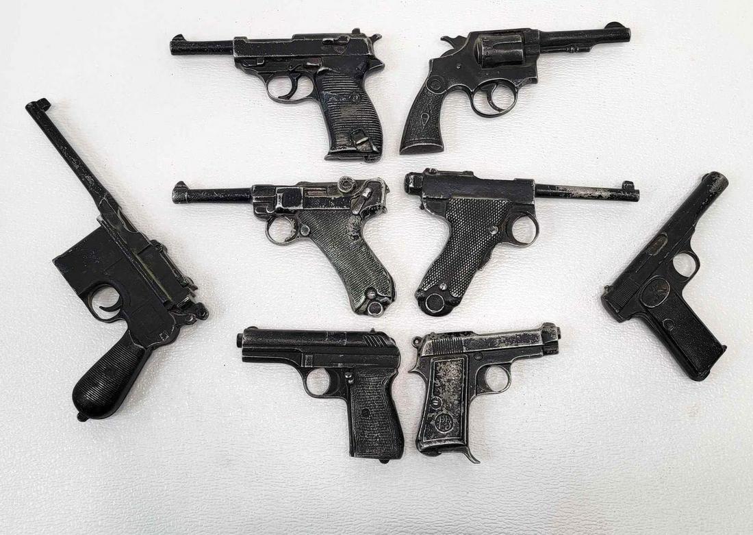8x Lytle Novelty Co. 1940s Pistol Replica Toys: An expansive grouping of eight cast aluminum replica pistol toys, manufactured by the Lyle Novelty Company in the late 1940s or early 1950s. Includes a Belgian 7.62 automatic, German P-38, German 9mm 