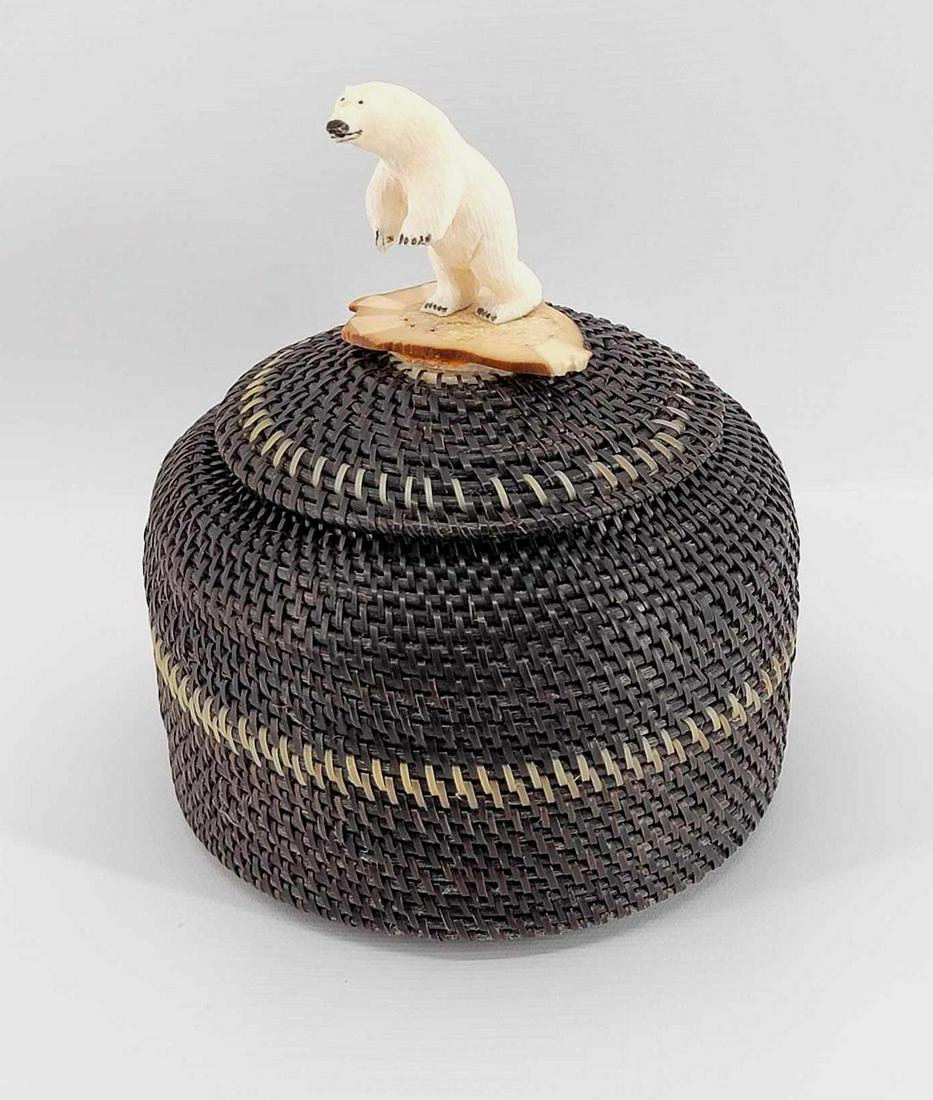 Inupiaq Baleen Basket w/Standing Polar Bear Finial by Marilyn Hank Otton: A museum-quality multi-colored Eskimo baleen basket with carved walrus tusk charger and large carved walrus tusk standing polar bear finial by Marilyn Hank Otton of Point Hope, AK. Measures approximat