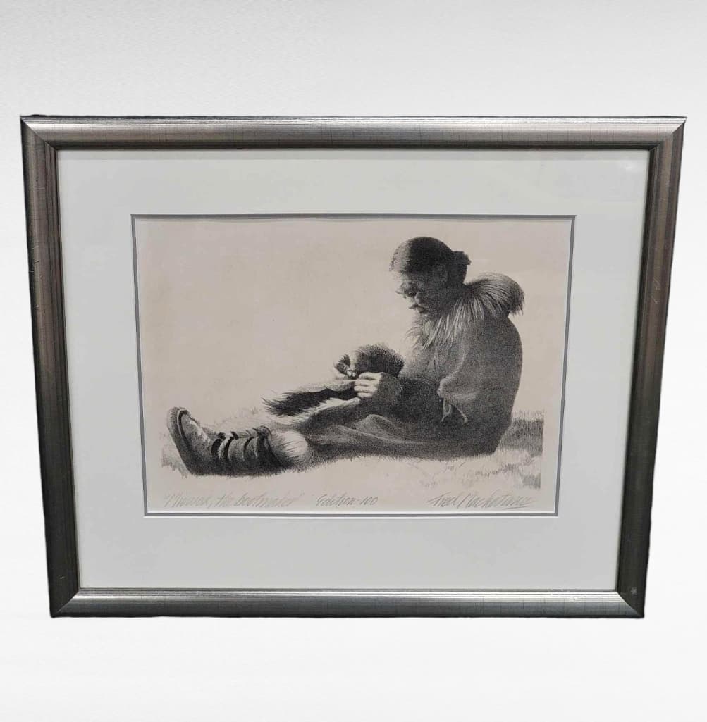 Fred Machetanz "Miowak, the Bootmaker" Stone Lithograph: A stone lithograph c.1956 by the late Alaskan artist, Fred Machetanz (1908-2002) entitled 'Miowak, the Bootmaker'. The work depicts Miowak, daughter of the last chief in Unakaleet, whom the ar