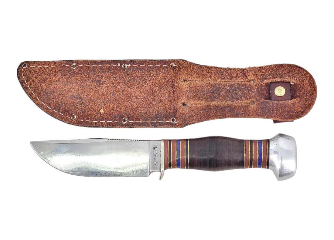 Remington Hunting Knife w/ Leather Sheath & Case: U.S. made Remington RH-33 stainless steel fixed drop point knife with jimping, large belly and blood groove, ricasso with Remington name and model; the hilt with front quillion, stacked leather handle