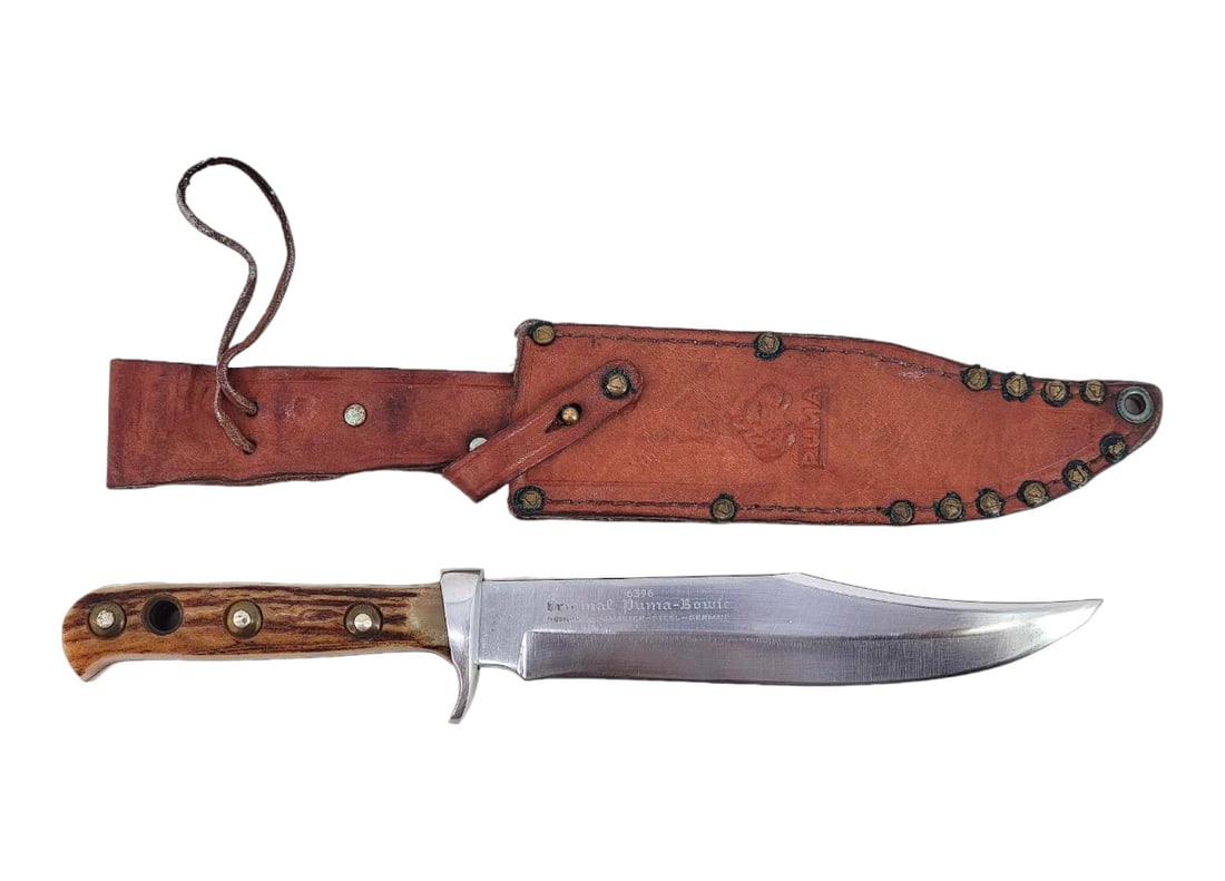Puma Stag Handle Bowie Knife w/Sheath: Solingen, Germany Puma stag handle stainless steel Bowie (6396) with prominent primary grind, ricasso, full tang construction, front and rear quillions, steel rivets and lanyard hole. Stamped on the f