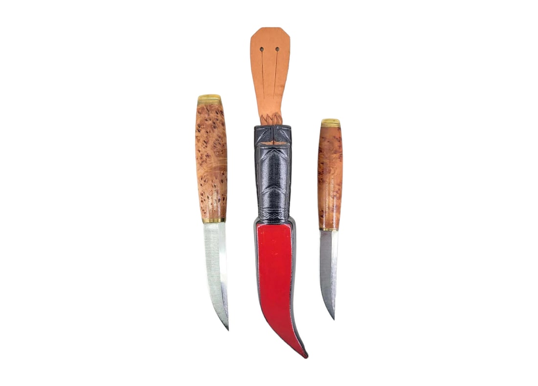 Fixed Blade Puukko Hunting Knives & Sheath: A pair of fixed blade puukko-style hunting knives marked for "AK" on the flats. They feature straight back blades with rat-tail tangs, polished wood handles, and brass end caps, and they come 
