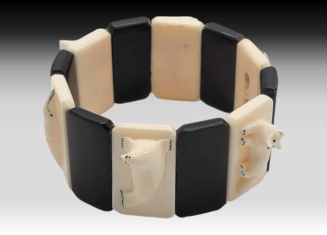 Walrus Tusk & Baleen Panel Bracelet - D. Soolook: A stunning panel bracelet featuring a dozen alternating walrus tusk and whale baleen tiles, the tusk carved Arctic wildlife to include polar bear, walrus, whale, and seal; bracelet is on a double stre