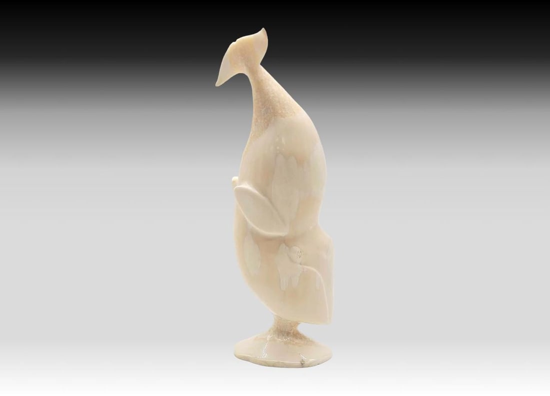 Walrus Tusk Humpback Whale - Iver Campbell: A very large walrus tusk carved humpback whale in breaching position upon a small integrated tusk pedestal. Signed on the underside by Yup'ik artist Iver Campbell of Gambell, St. Lawrence Island, 