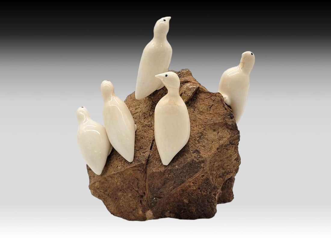 Walrus Tusk, Baleen & Fossilized Bone Rookery - Robert Apatiki: A rookery diorama featuring five walrus tusk Arctic terns with inset baleen eyes, each mounted upon a fossilized bone base. Signed on the underside by "Robert A.", believed to be Siberian Yup&