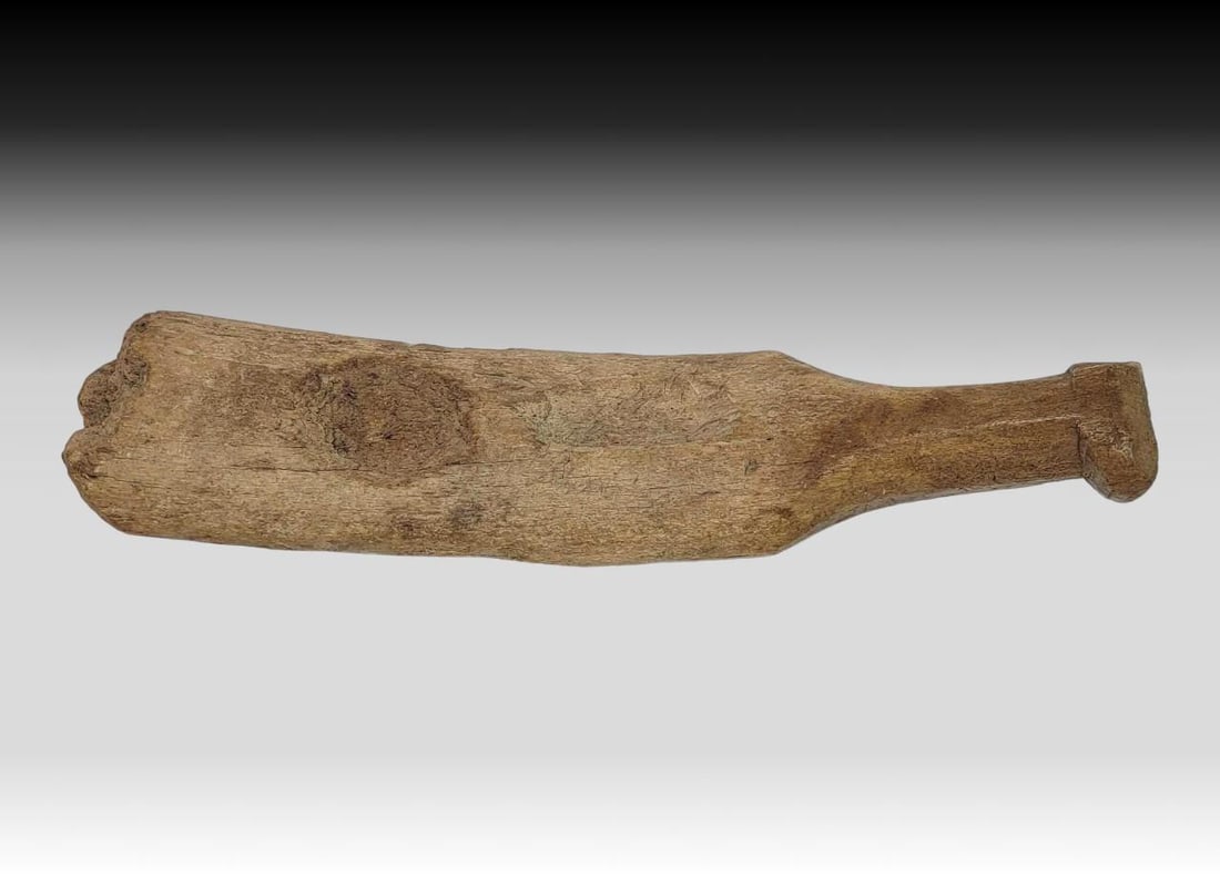 Thule Bone Hunting Club & Firestarter: A Thule period Eskimo club artifact carved from exceptionally dense and heavy mineralized bone, purported to be used for hunting seals and other small to medium-sized marine wildlife. One end of the o