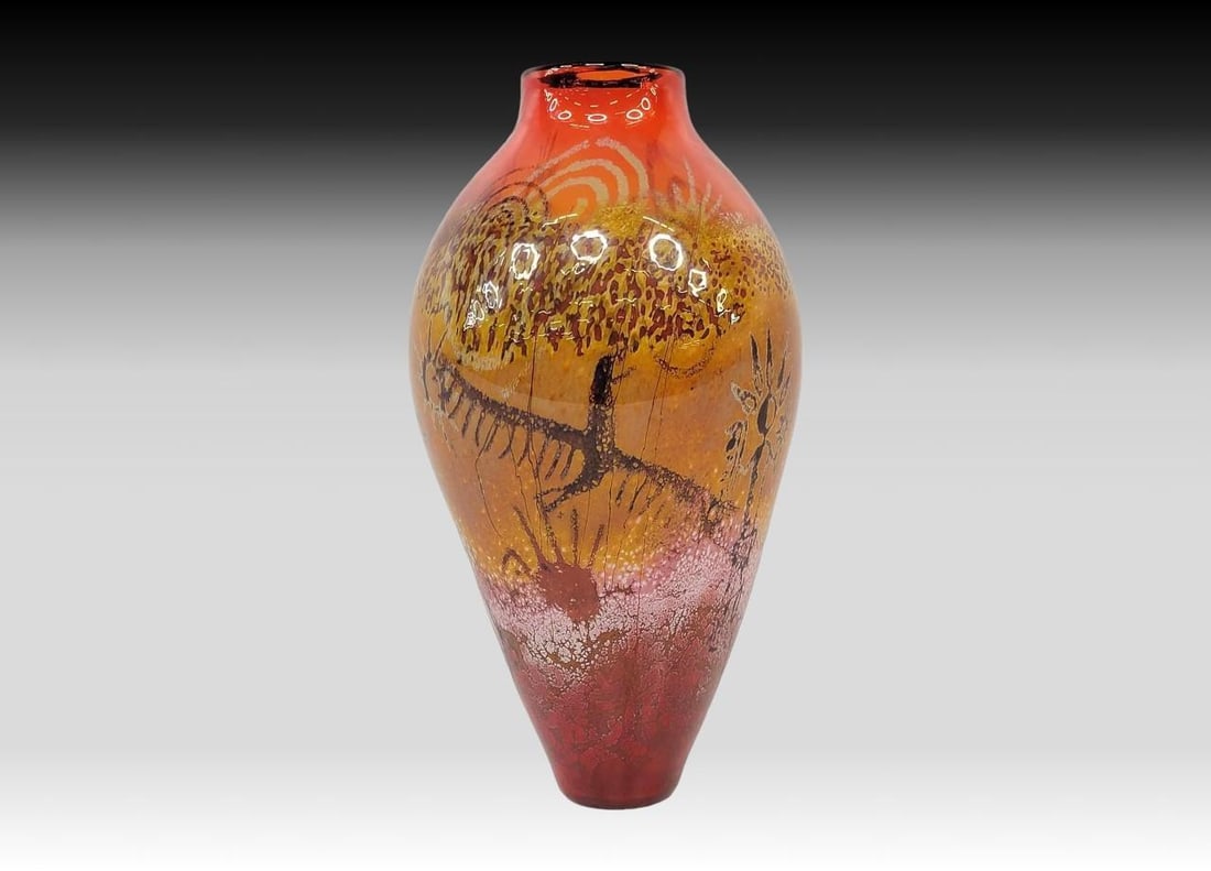Cranberry Petroglyph Art Glass Vase - Richard Satava: An impeccably handcrafted Cranberry Petroglyph Art Glass vase depicting a female deity, shield warriors, eagle, sunburst, and spiral, all done in various shades on top of a fumed background. The inter