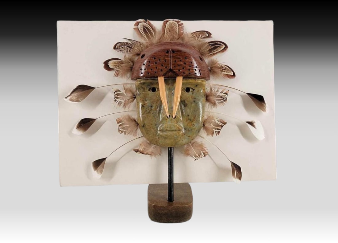 Soapstone & Cottonwood Spirit Mask - Bowhan Kealiher: A stunning spirit hunter's mask with carved soapstone face, topped with a carved and drilled cottonwood walrus fitted with fossilzed walrus tusks. Mask is accented with six long and fourteen small