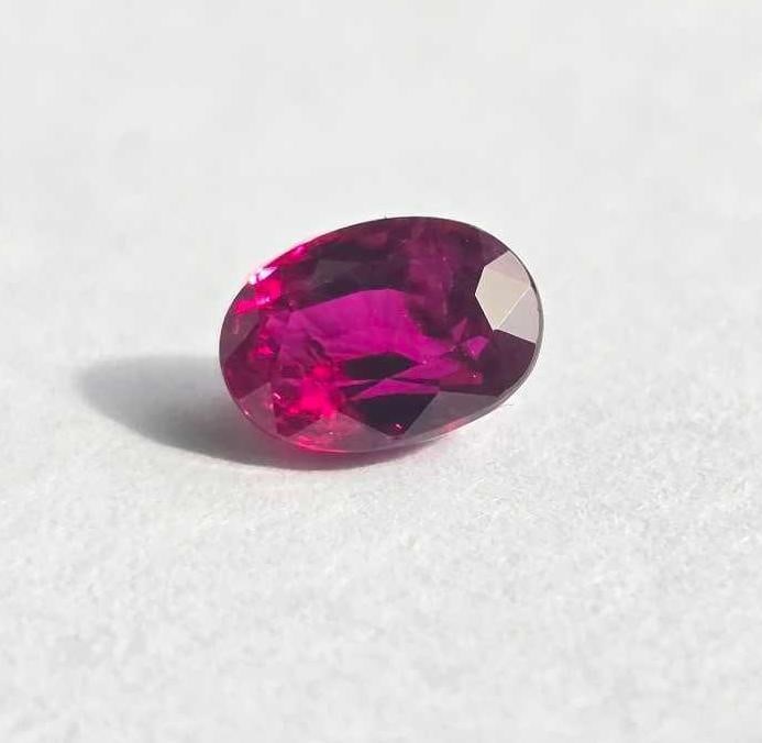 1.30ct Oval Cut Natural Ruby w/AGL Cert Unheated: A 1.30 carat natural ruby gemstone with an oval mixed cut measuring 7.33 x 5.25 x 3.75mm, a good color grade of 5/80, clarity of moderate inclusions, and good proportions. Gemstone is accompanied by a