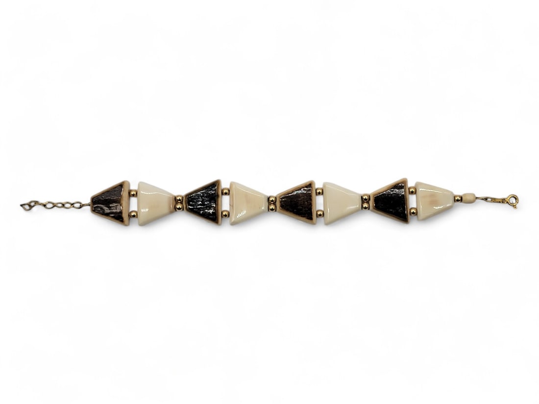 Mammoth & Walrus Tusk Bracelet w/ 14k Gold Beads & Chain: A bracelet handcrafted with four trapezoid-shaped fossilized tusk tiles, and four in contemporary walrus tusk. Tiles are spaced with 14 karat gold beads, and bracelet terminates with a short length of