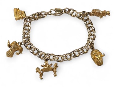 An Alaskan Gold Charm Bracelet