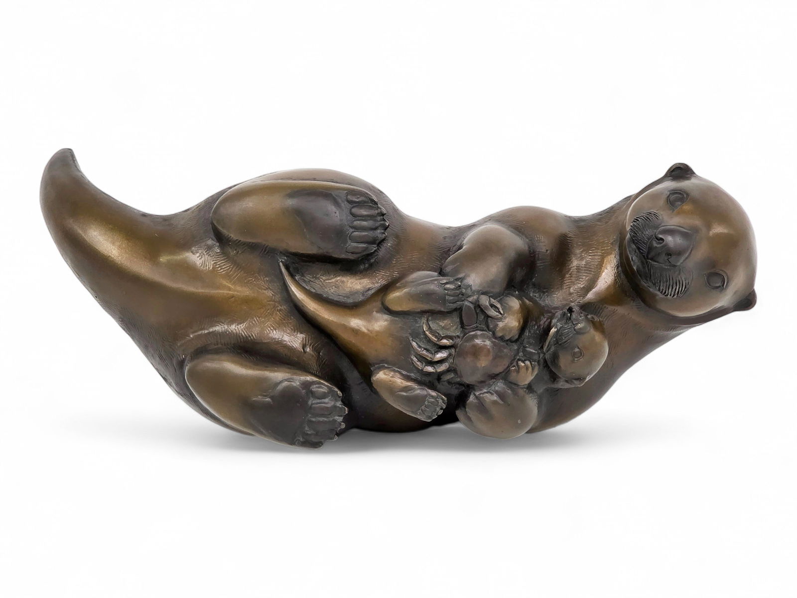 Jacques & Mary Regat "Little Gourmet" Bronze Sculpture: A limited edition 12/25 bronze sculpture titled "Little Gourmet", c.1987 by Alaska artists Jacques Regat (b.1948) and Mary Regat (b.1943) of the husband-wife team of sculptors from the renowned Regat