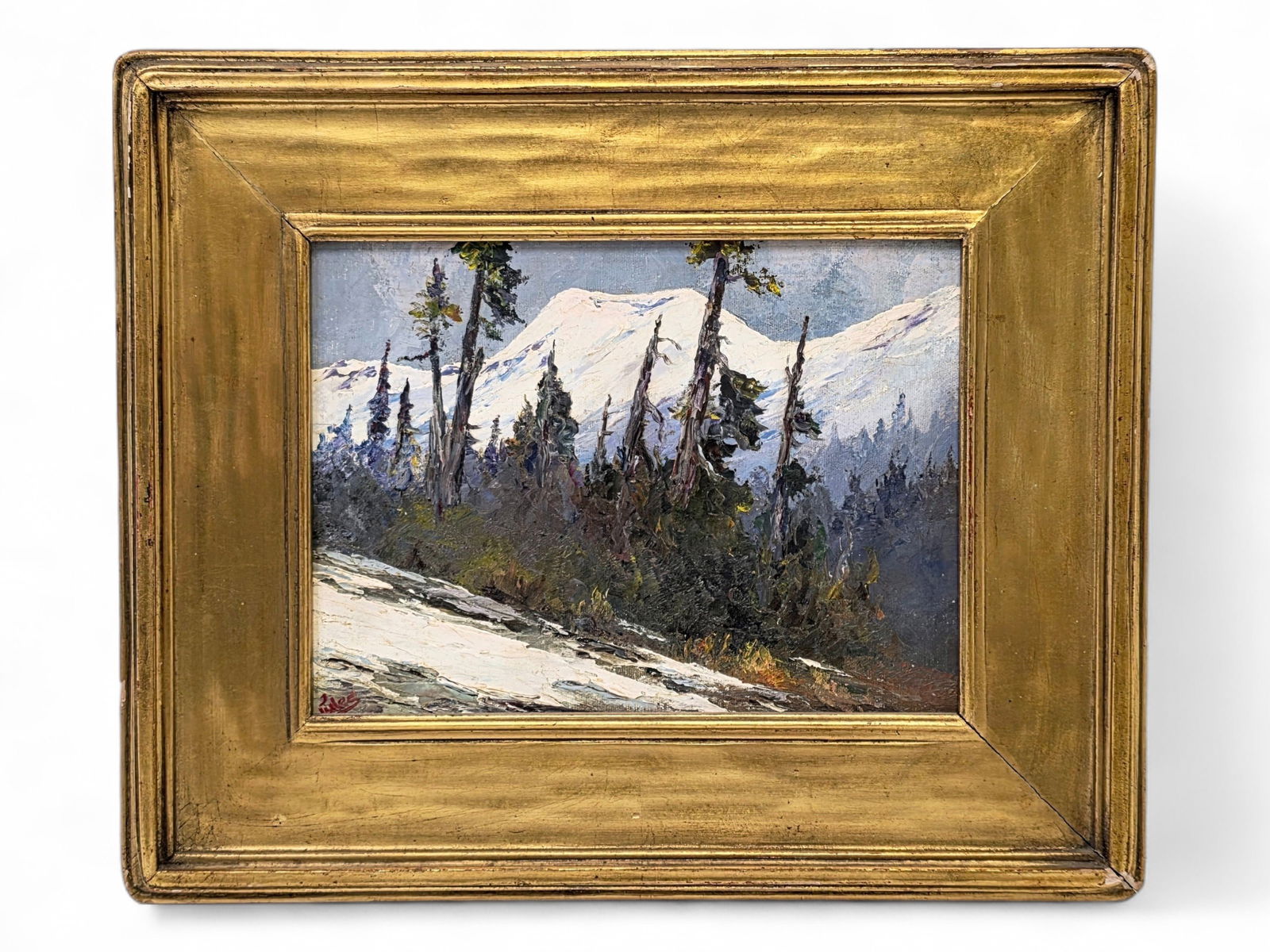 Jules Dahlager Oil Painting of Mount Achilles: An original oil painting depicting a snow-capped Mount Achilles in Ketchikan, Alaska, foregrounded by evergreen trees and brush, signed lower left and en verso by Alaska artist Jules P. Dahlager