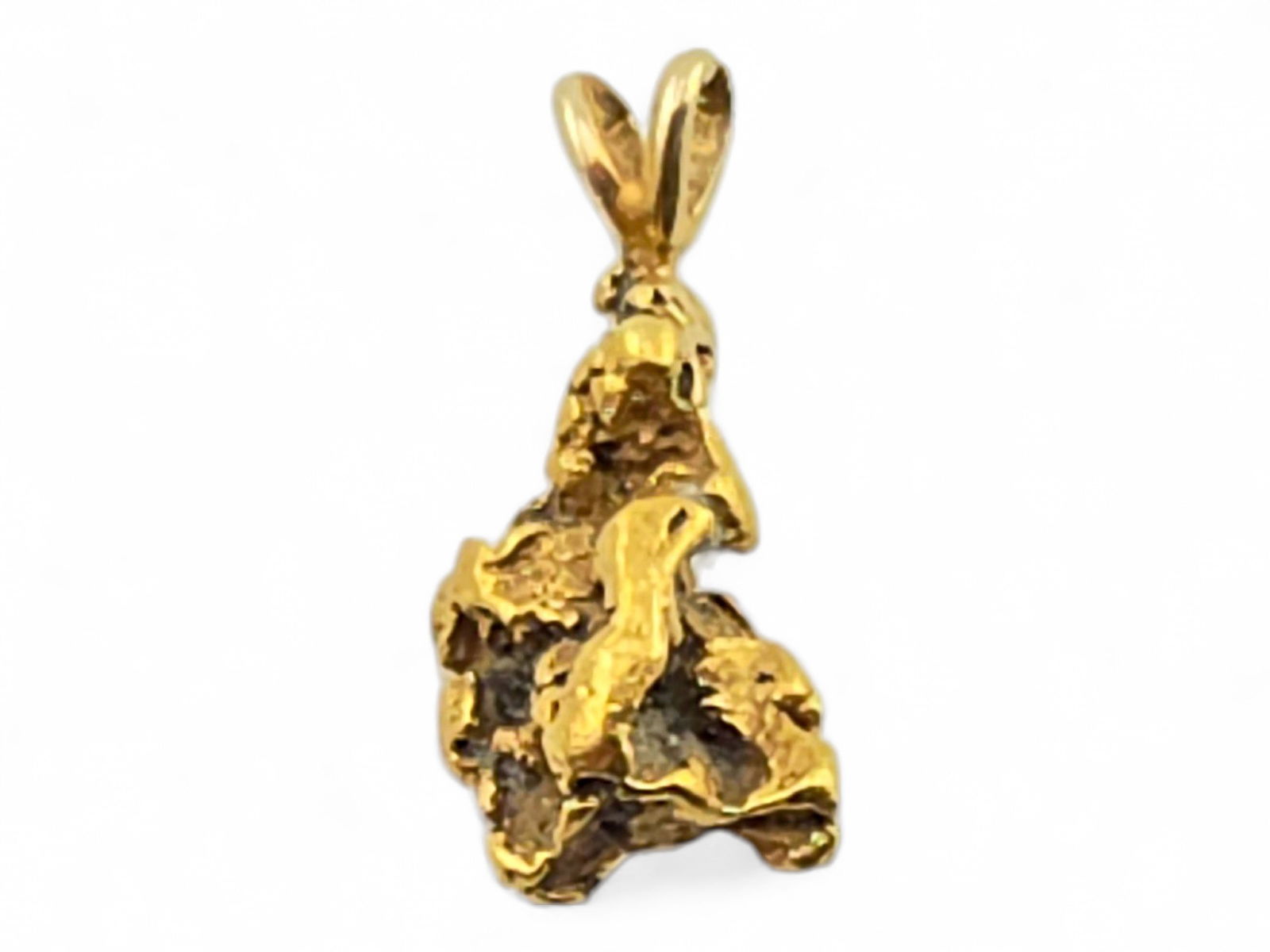 2.30 Gram Alaska Gold Nugget Pendant: An Alaska gold nugget pendant featuring a 10 karat yellow gold bail, oriented so the nugget is hanging in a vertical fashion, such that it is longer than it is wide. It measures approximately 1"