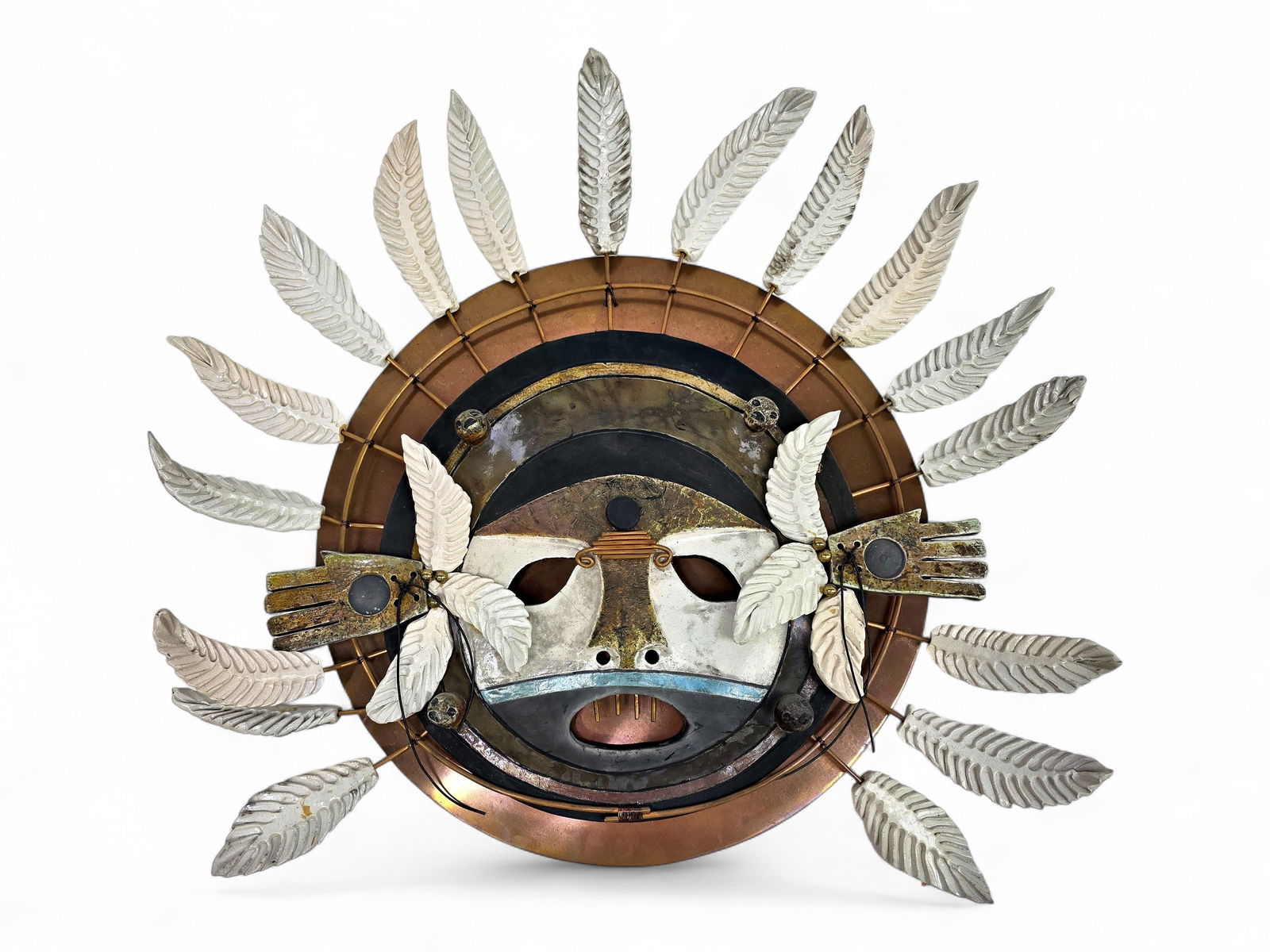 Yup'ik Inspired Mixed Media Mask Sculpture - Raku, Metal, Wood: A spirit mask by contemporary Alaska artist Marilyn Kaminsky Miller (20th/21st Century), constructed with a copper base encircling a central masked face rendered in raku-fired ceramic. The