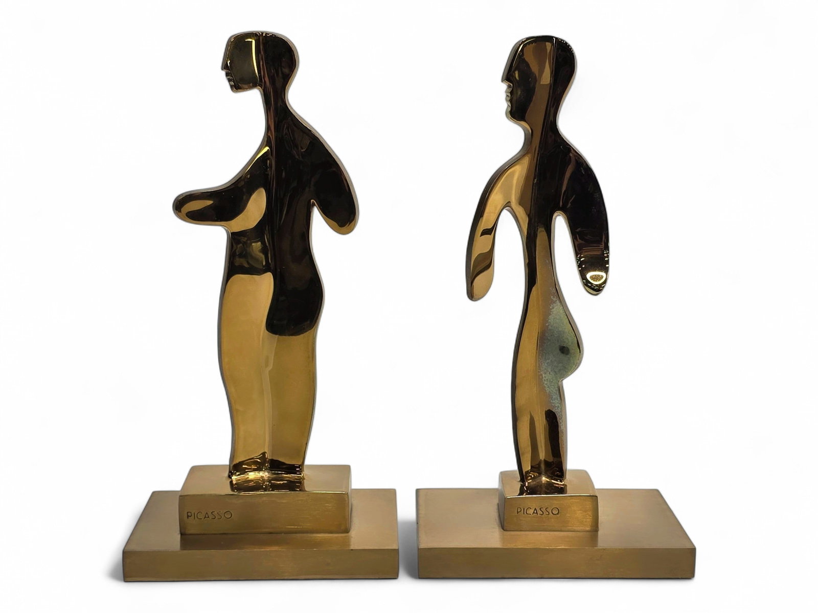 "L'Homme et la Femme" (The Man and the Woman) Bronze Sculptures After Pablo Picasso: Two limited edition numbered 142/175 bronze sculptures titled "L'Homme et la Femme" (The Man and the Woman), marked upon their bases with "PICASSO" after the original c.1965 terracotta forms created b