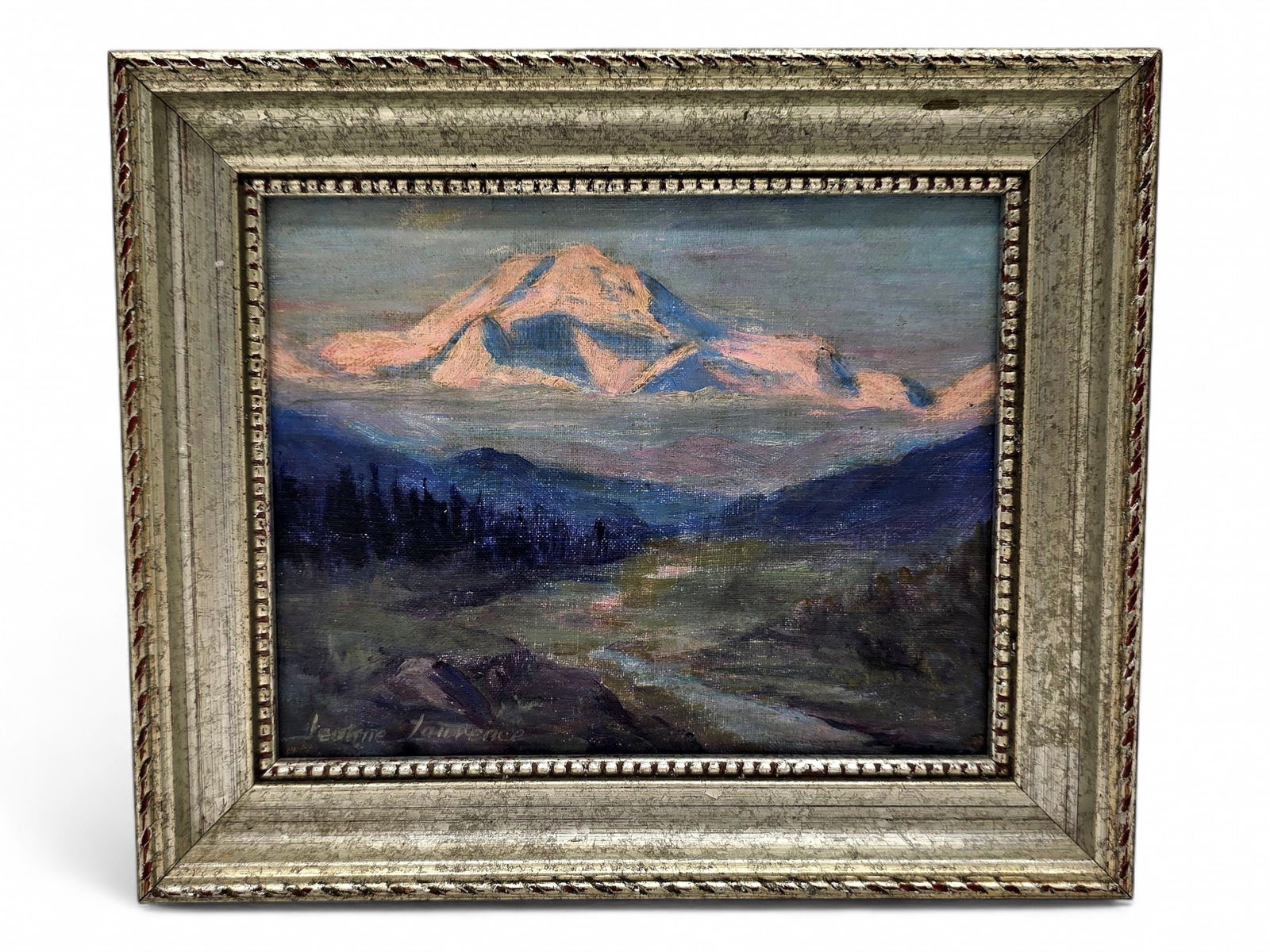 Jeanne Laurence Oil Painting of Mount McKinley: An original oil painting depicting Mount. McKinley at sunset with a stream in the foreground, signed lower left by Alaska artist Jeanne Laurence (1887-1980), the wife of the prominent Alaska artist Sy