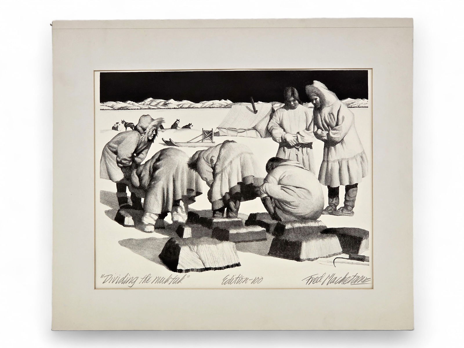 Fred Machetanz "Dividing the Muktuk" Stone Lithograph: A stone lithograph c.1969 by the late Alaskan artist, Fred Machetanz (1908-2002) entitled 'Dividing the Muktuk'. The work depicts a group of women at work with their crescent-shaped ooloos (knives) di