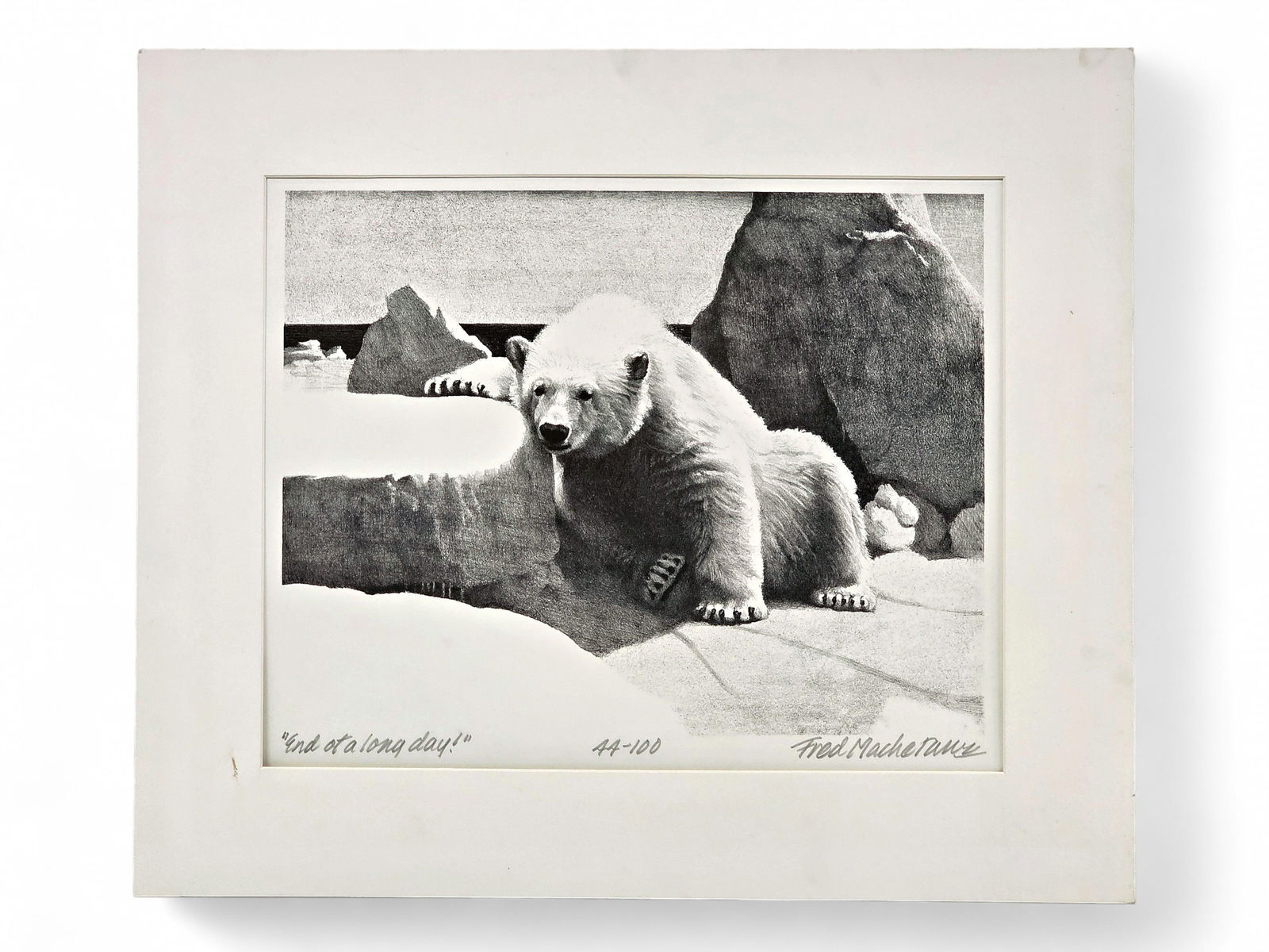 Fred Machetanz "End of a Long Day!" Stone Lithograph: A stone lithograph c.1979 by the late Alaskan artist, Fred Machetanz (1908-2002) entitled "End of a Long Day!" The work depicts a five-month-old polar bear cub resting beside an ice cake after having