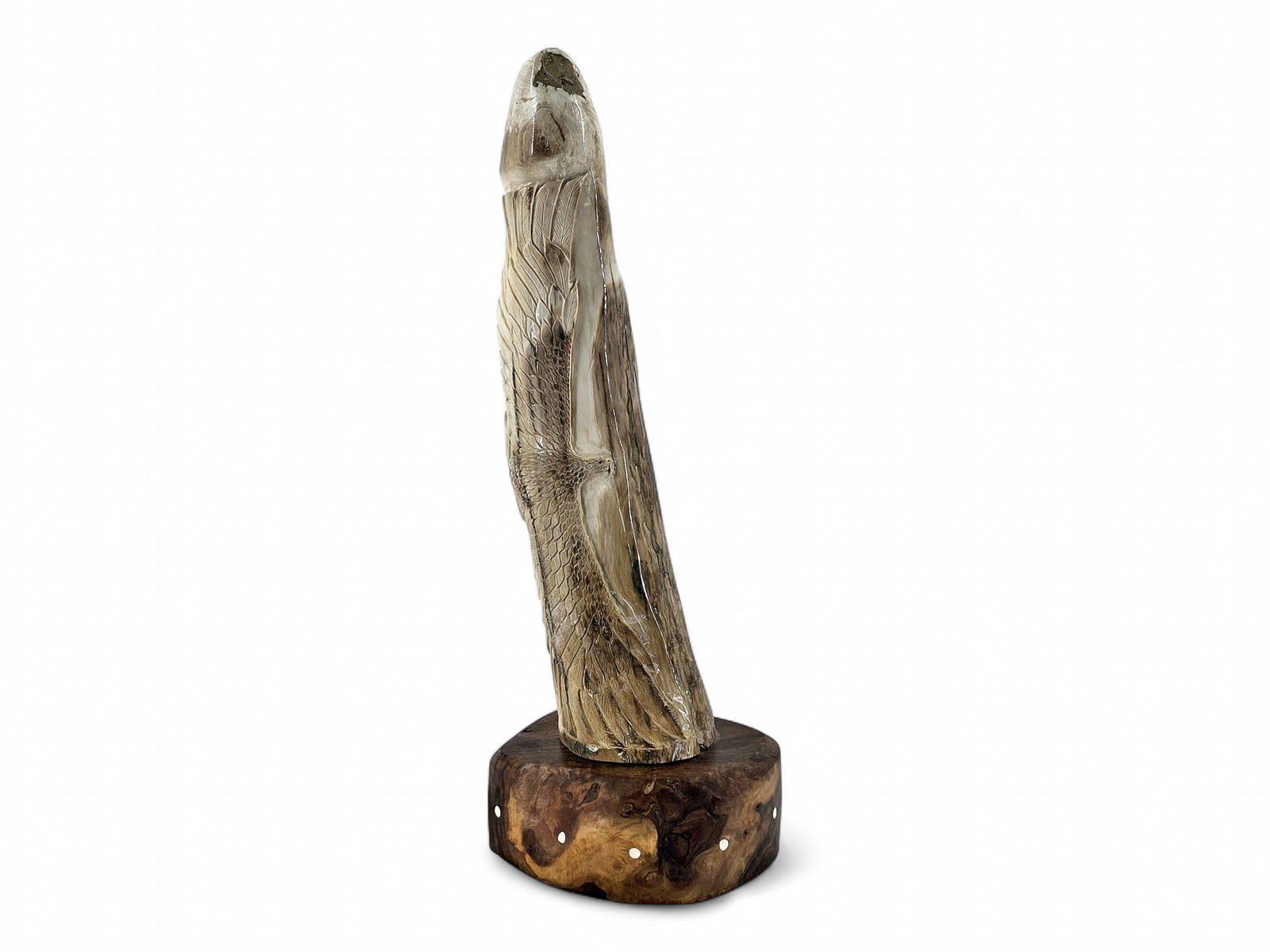 Large Mammoth Tusk Carving - Eagle on Burled Wood Base - Sam Dimmick: A fine section of mammoth tusk featuring an eagle carved in relief with its wings spread and intricate feather details. Mounted loosely upon a burled wood base accented with inlaid dots of ivory,