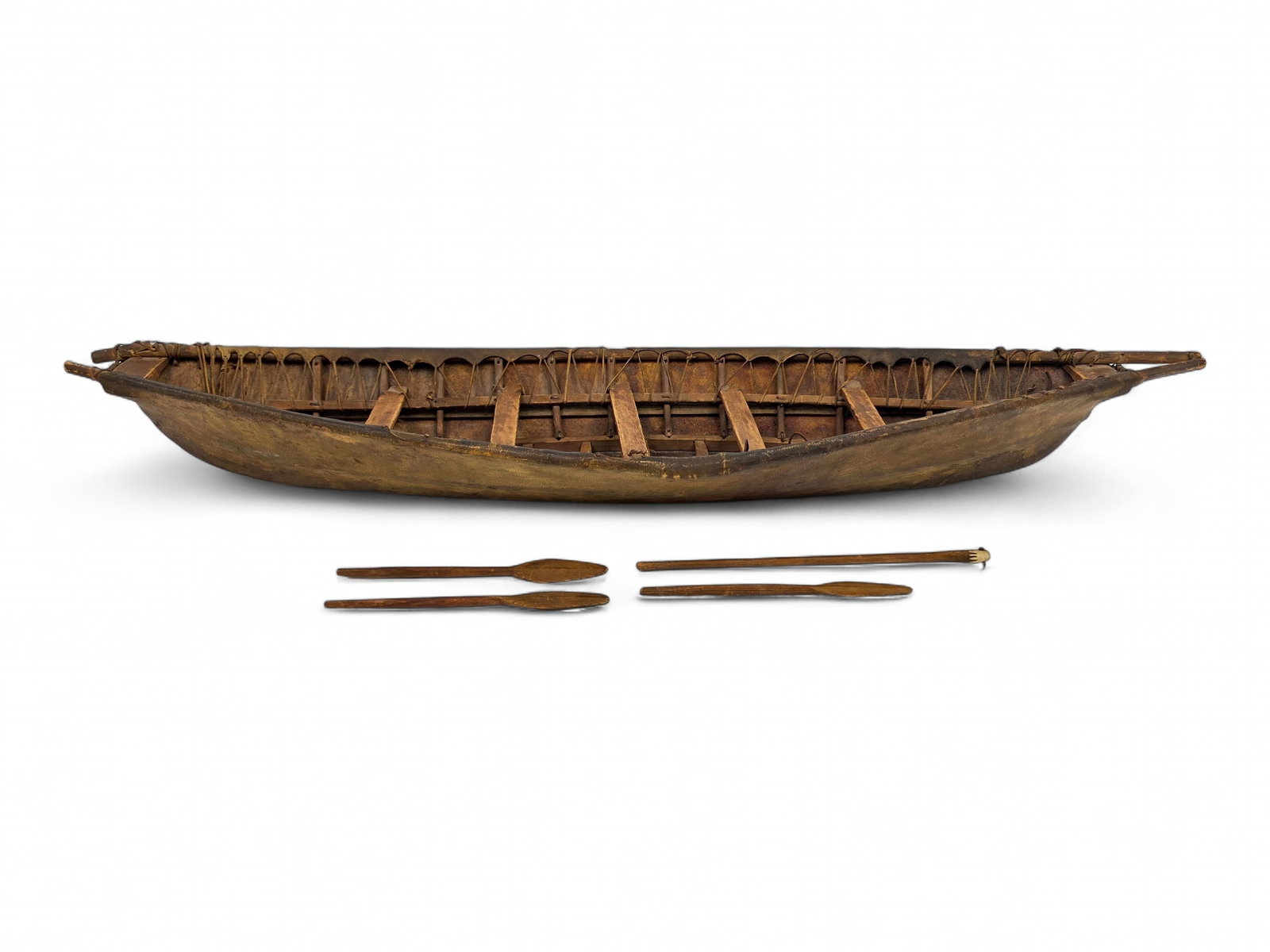 Large 19th C. Eskimo Umiak Skin Boat Model: A large and well-detailed 19th-century Alaska Native model umiak, faithfully representing the traditional open skin boats used by the Inupiaq and Yup'ik peoples for transporting families, goods, and