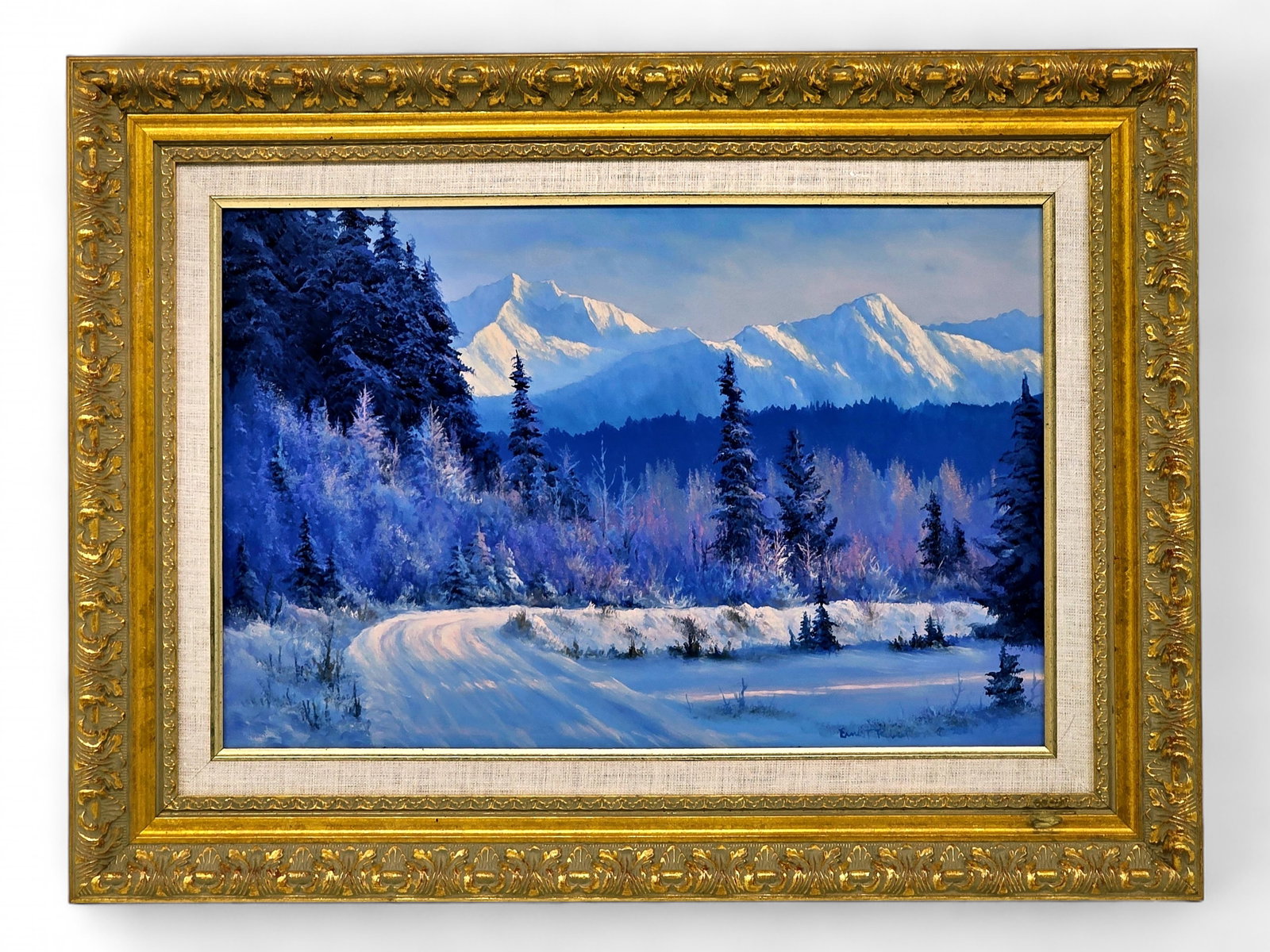Ernest E. Robertson Denali Winter Landscape Oil Painting: An exceptional original oil painting by Alaska artist Ernest E. Robertson (born 1939), depicting a tranquil winter scene in the Alaska interior with a snow-covered trail leading through frost-laden sp