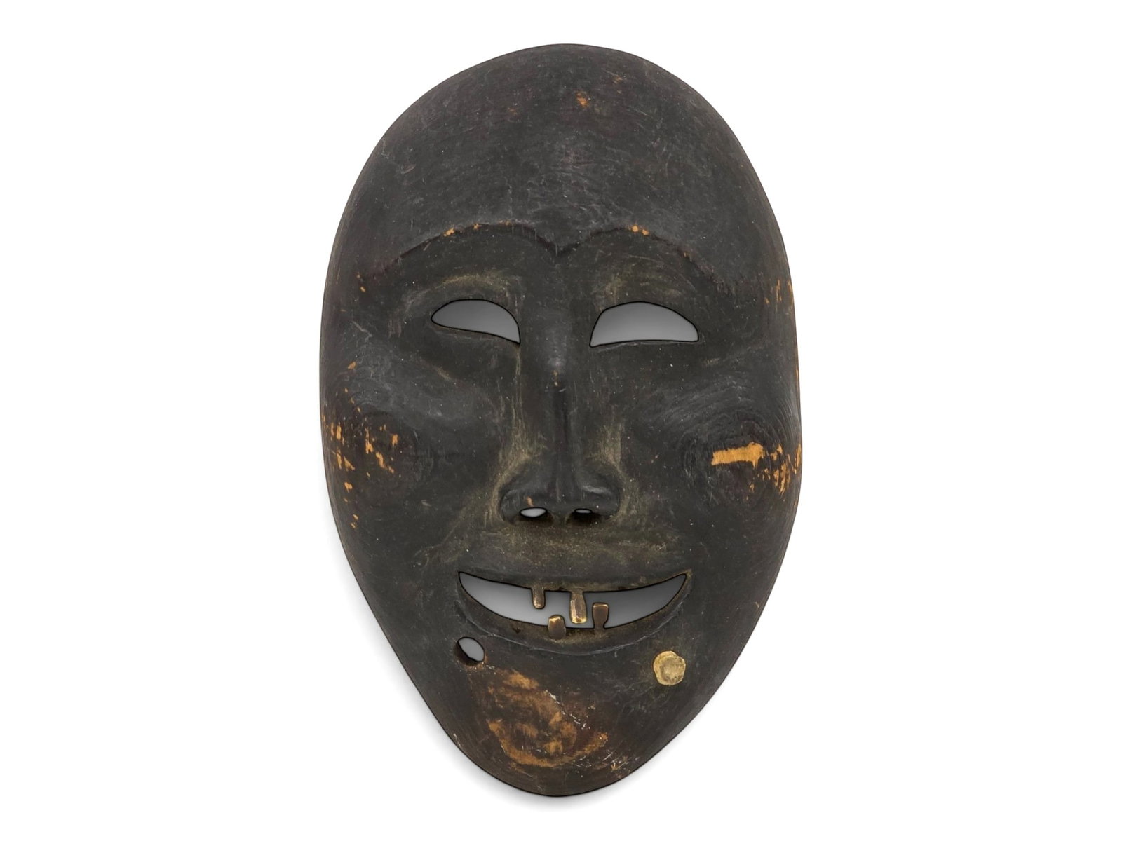 Expressive Late 19th C. Point Hope Inupiaq Mask: An important late nineteenth-century Inupiaq Eskimo face mask from Point Hope, Alaska, distinguished by an extraordinarily engaging expression and a sculptural refinement that elevates it well beyond 