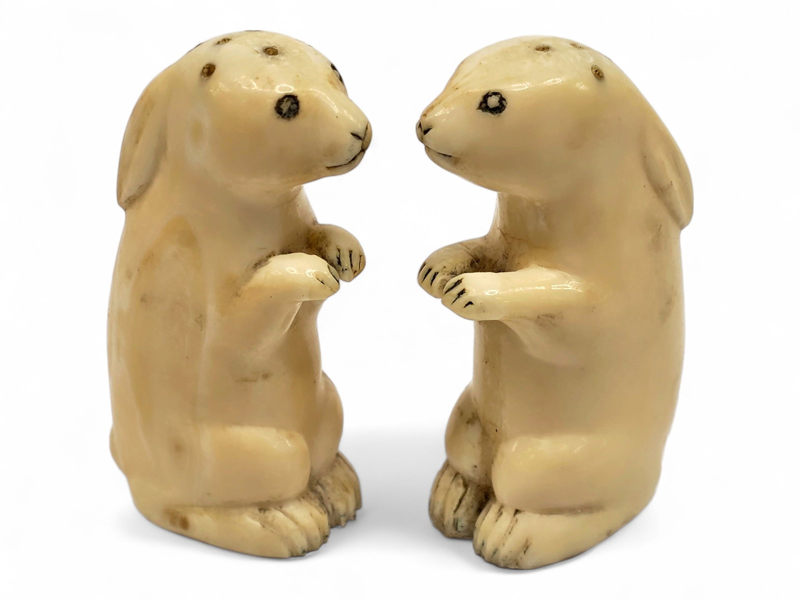 Pair of Early Mineralized Walrus Tusk Hare Shakers, Possibly Happy Jack (1 of 7)