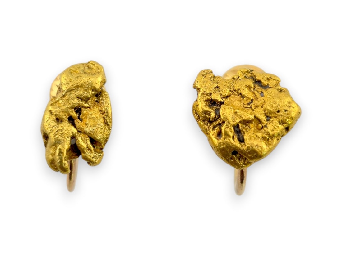 14K Yellow Gold & Alaskan Gold Nugget Stud Earrings: A handsome pair of 14-karat yellow gold earrings set with naturally occurring Alaskan placer gold nuggets. Each nugget retains its irregular shape and richly textured surface, highlighting the unique 