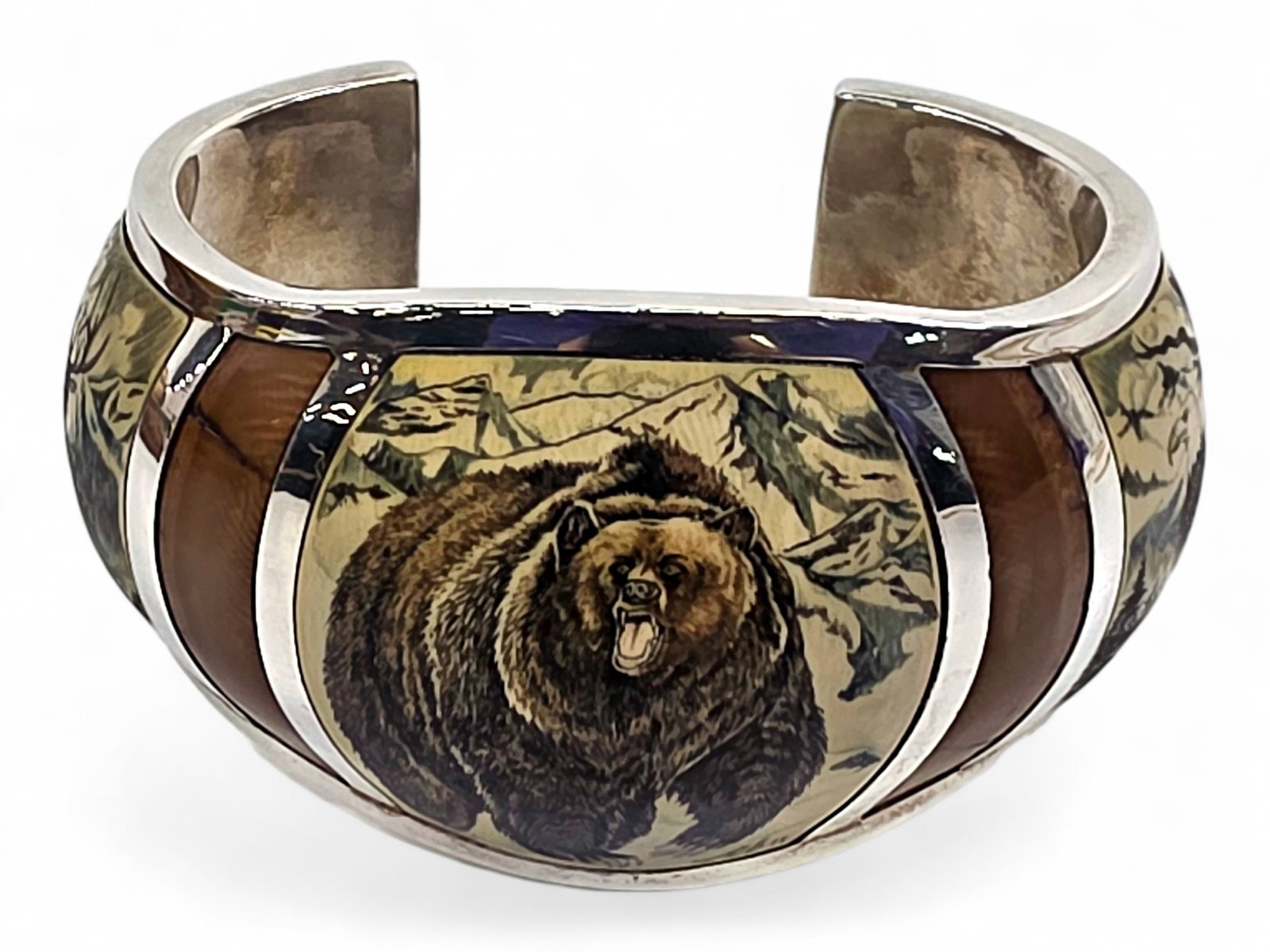 Sterling Silver & Walrus Tusk Scrimshaw Bracelet - Anne Burn for ASI: A substantial sterling silver cuff bracelet produced by the Alaskan Silver and Ivory Company and hand-engraved in 1977 by scrimshaw artist Anne E. Burn. Accompanying documentation dated June 9, 1977 i