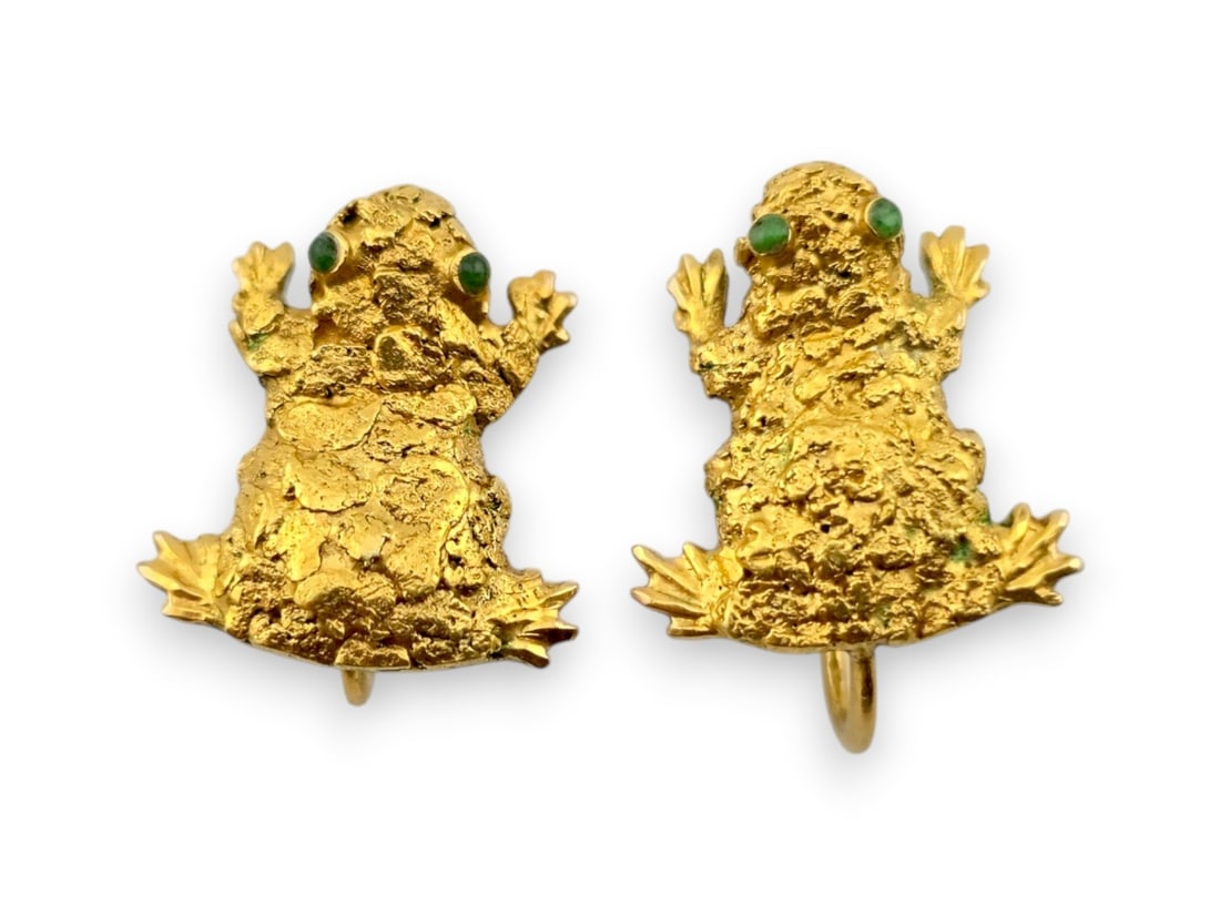 Pair of 10K Gold & Alaskan Gold Nugget Frog Earrings with Jade Eyes: An adorable pair of 10-karat yellow gold frog earrings featuring richly textured natural Alaskan gold nugget bodies accented with carved gold feet and hands. The frogs are further embellished with vib