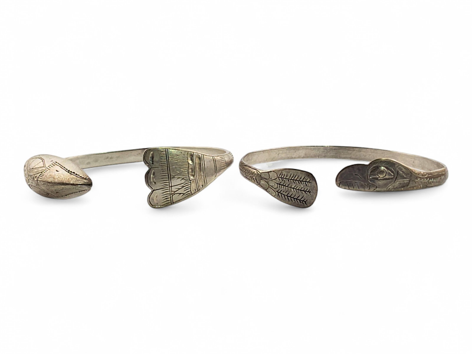 Pair of Tlingit Sterling Silver Raven Form Bracelets (1 of 9)