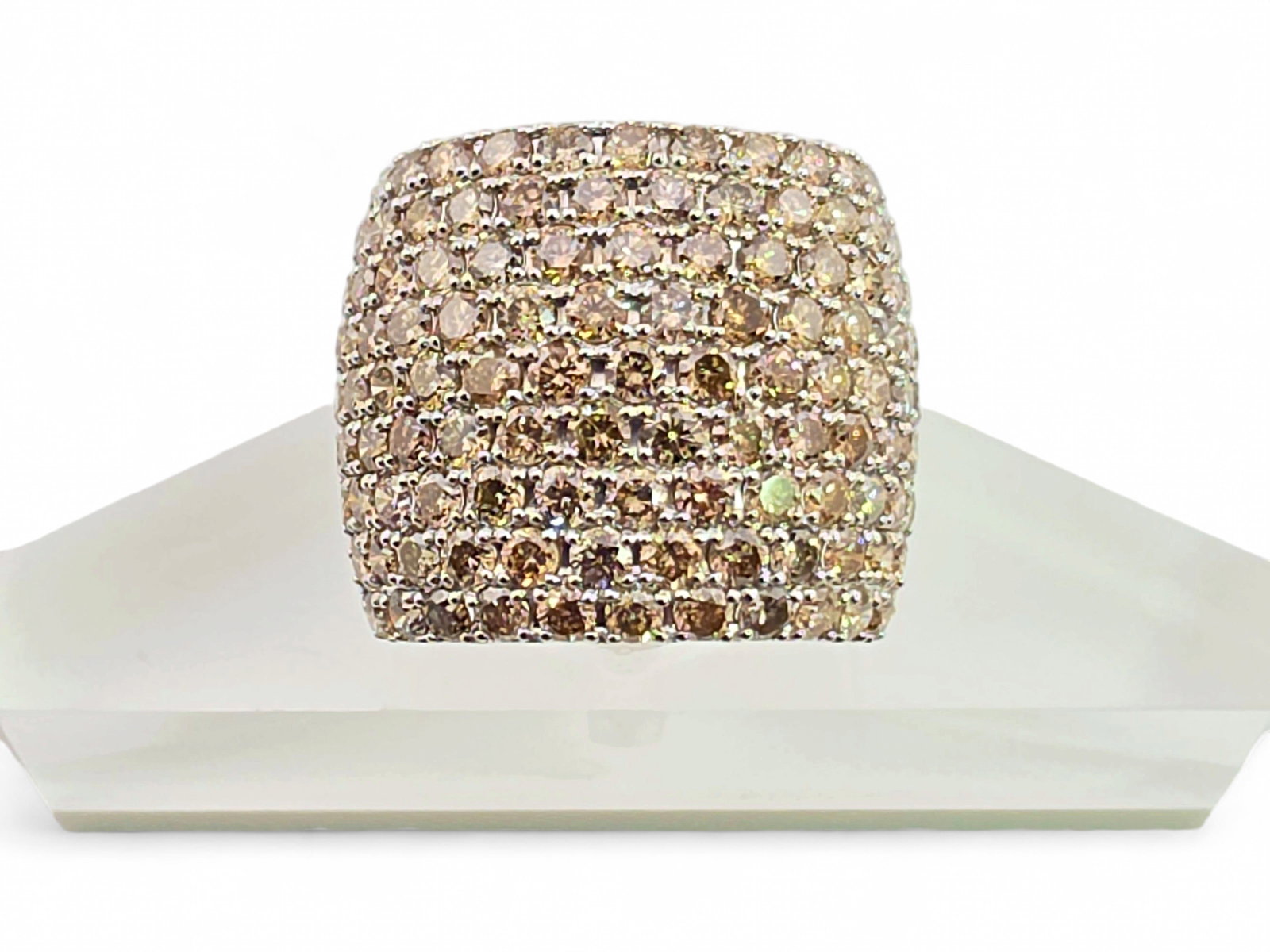 4.00 CTW Champagne Diamond Pavé Cocktail Ring in 18K White Gold: An impressive size 6.25 cocktail ring crafted in 18-karat white gold and lavishly set with natural round brilliant-cut champagne diamonds totaling 4.00 carats. The ring features nine sweeping rows of 