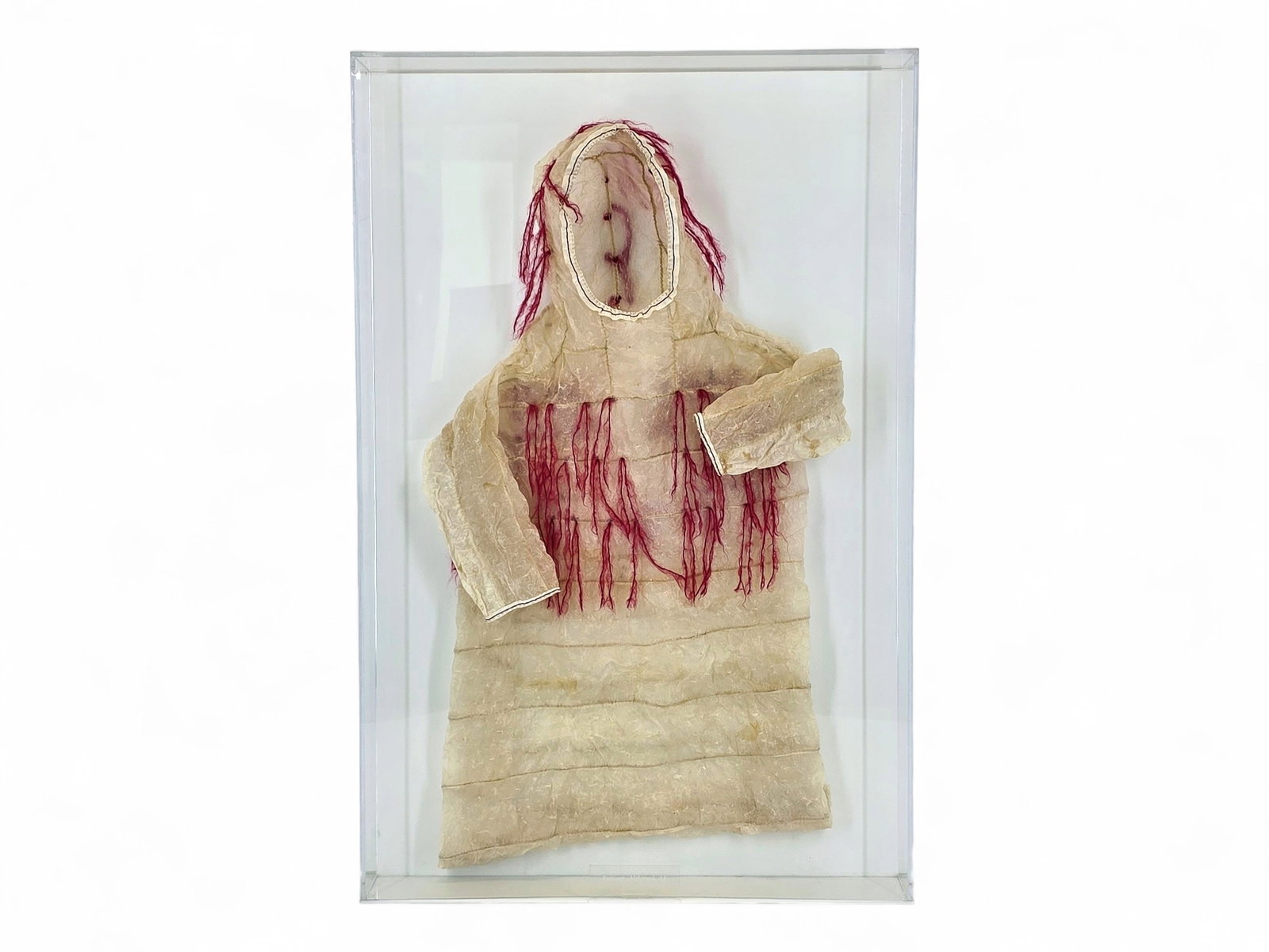 Contemporary Yup'ik Seal Gut Raincoat - Edna Mathlaw: A finely crafted Yup'ik seal gut raincoat (imarnin) by Edna Mathlaw of Mekoryuk, Nunivak Island, Alaska, executed in 2014 using traditional techniques that trace their origins back centuries. Fashione