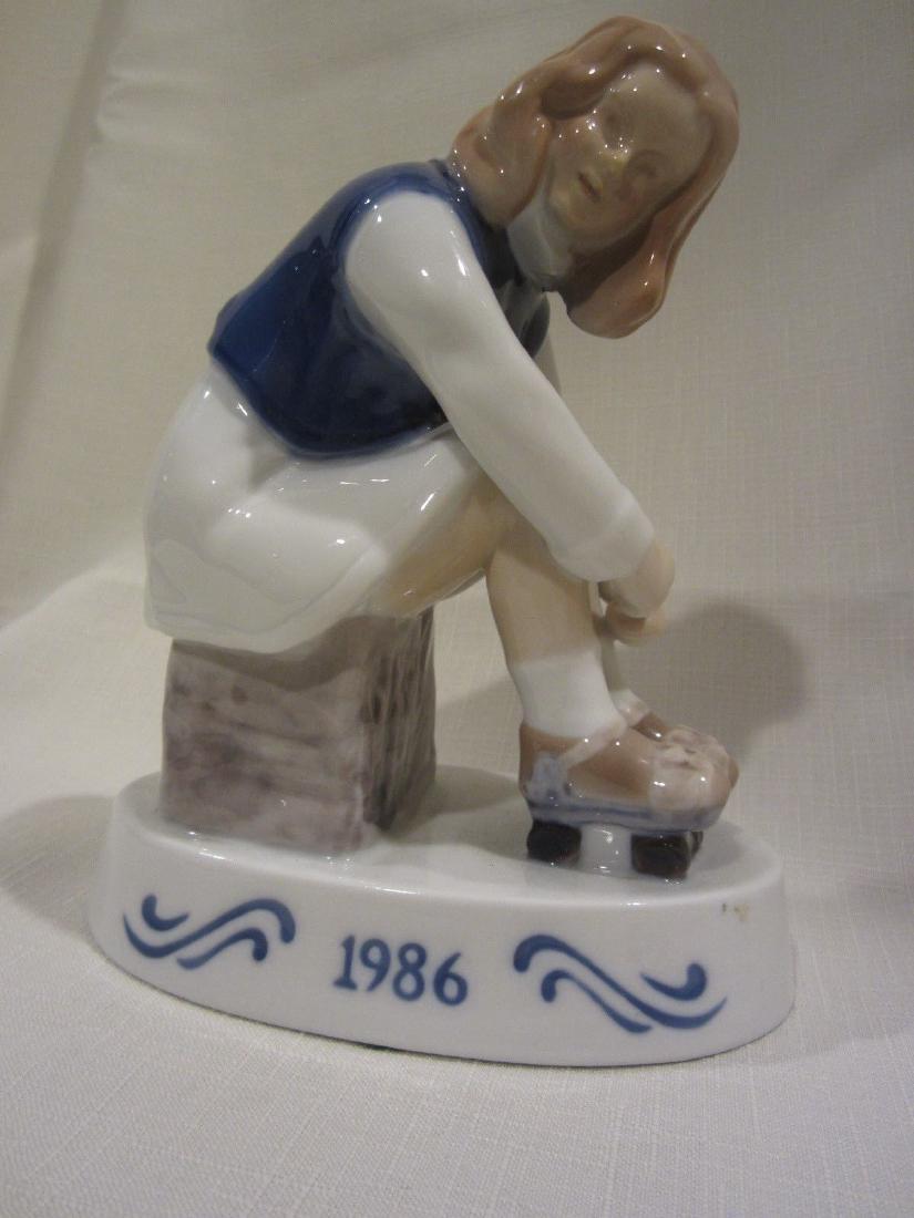 Vintage Bing & Grondahl 1986 Limited Edition Figurine: Stock # A2580 - Vintage Bing & Grondahl 1986 Limited Edition Figurine "Jenny - The Little Roller Skater" Figurine of the Year Signed on bottom Limited Edition Made in Denmark. No chips, cracks, or cra