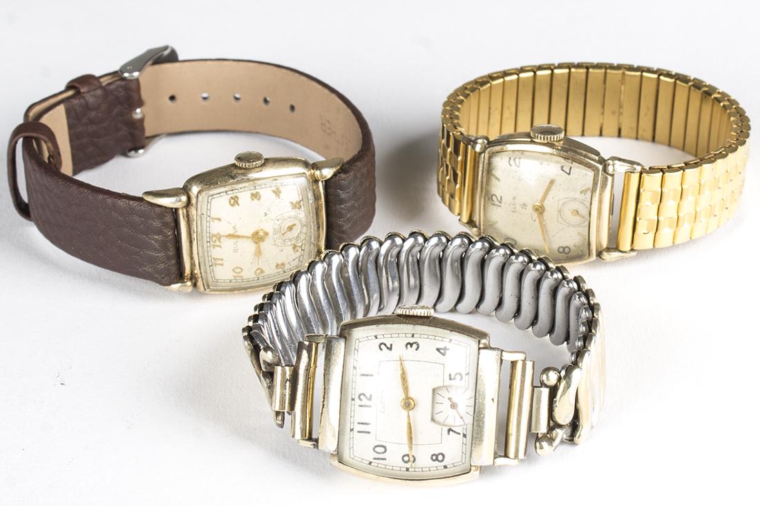 3 Vintage Watches including Bulova & Elgin: A. 1948 BULOVA 21 jewel hand wind wristwatch (His Excellency XX). 10BH movement. Golden hands and Arabic numerals. Seconds subdial. 10kt gold filled case,serial #9763011. 26mm case, 16mm lugs.Brown le