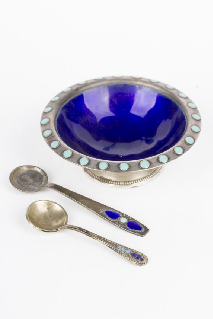 Vintage Russian Silver Enameled Salt Bowl and Spoons: Vintage Russian silver (0.916) and enameled salt bowl and 2 spoons. Bowl is enameled in deep bluewith light blue dots. Both spoons have enameling on the handle. 2.5" in diameter x 1/2" in depth. Spoon